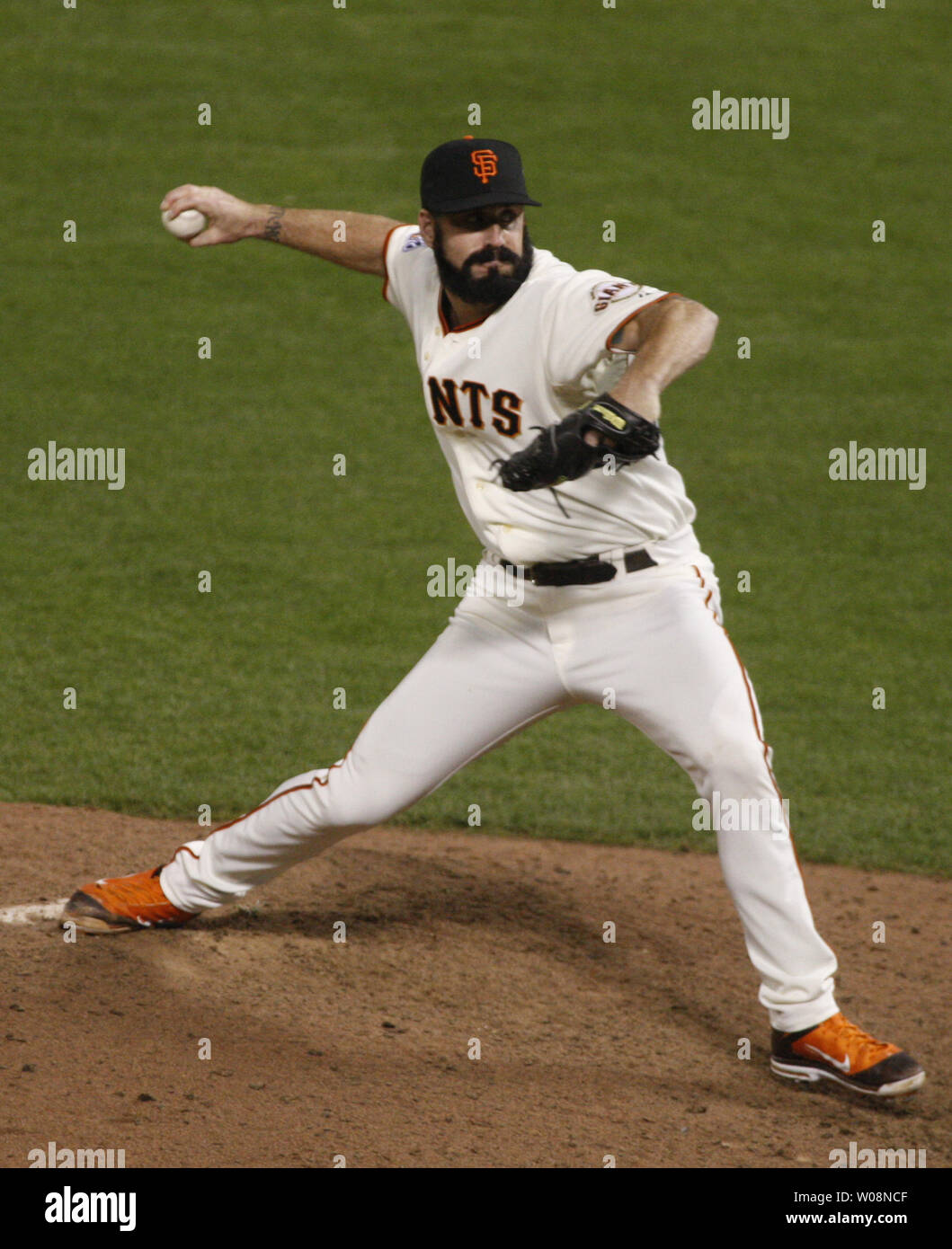 San Francisco Giants Brian Wilson (38) celebrates by jumping up on