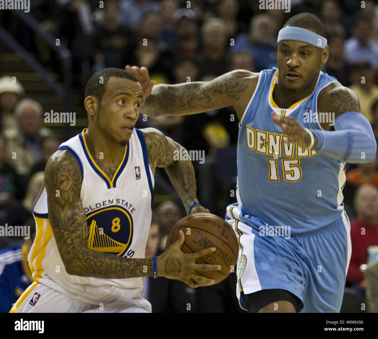 Carmelo Anthony of the Denver Nuggets grabs a rebound against Vince News  Photo - Getty Images