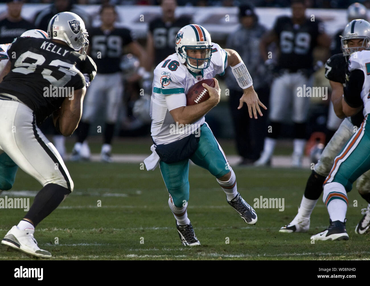 Miami Dolphins QB Tyler Thigpen (16) runs for yardage in the third quarter against the Oakland Raiders at the Oakland Coliseum in Oakland, California on November 28, 2010.  The Dolphins defeated the Raiders  33-17.     UPI/Terry Schmitt Stock Photo