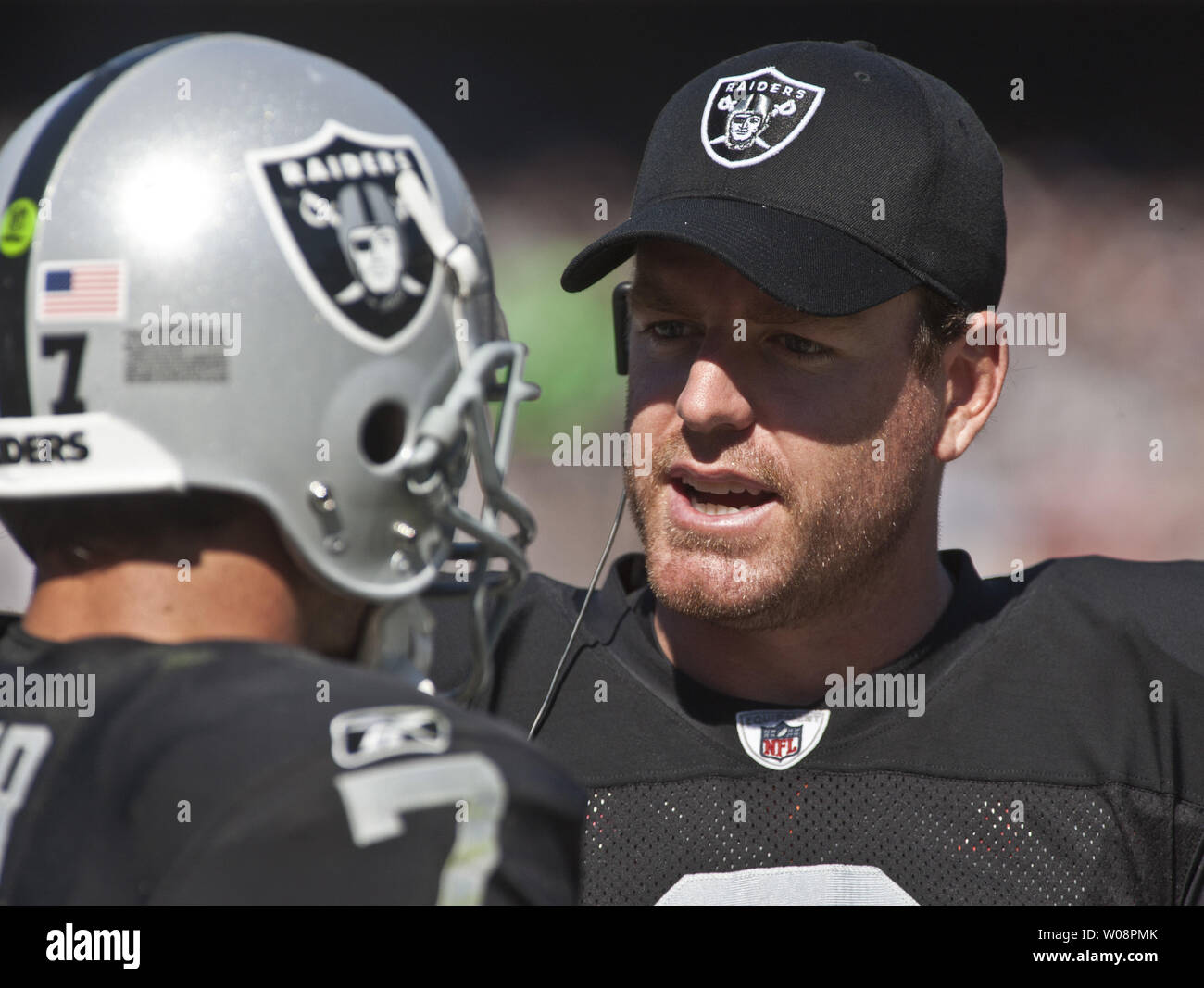 Oakland Raiders new QB Carson Palmer (R) talks with QB Kyle Boller (7) in the first half against the Kansas City Chiefs at the O.co Coliseum in Oakland, California on October 23, 2011. Each QB threw three interceptions in the 28-0 loss.   UPI/Terry Schmitt Stock Photo