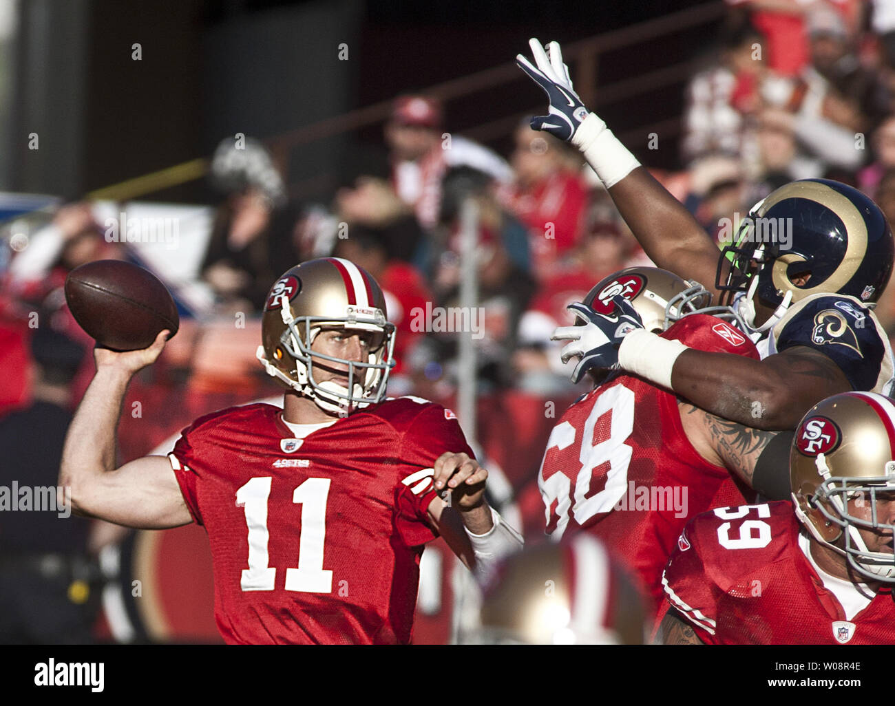 San Francisco 49ers QB Alex Smith (11) takes aim on a pass against the St. Louis Rams at Candlestick Park in San Francisco on December 4, 2011. The 49ers defeated the Rams 26-0 to clinch the NFC West.  UPI/Terry Schmitt Stock Photo