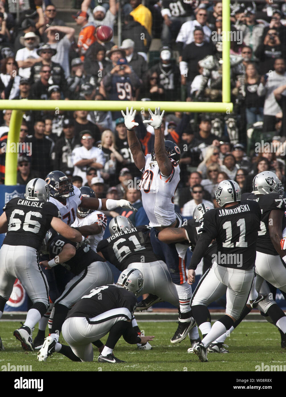 October 25, 2009; Oakland, CA, USA; Oakland Raiders kicker Sebastian  Janikowski (11) before the game against the New York Jets at  Oakland-Alameda County Coliseum. New York defeated Oakland 38-0 Stock Photo  - Alamy