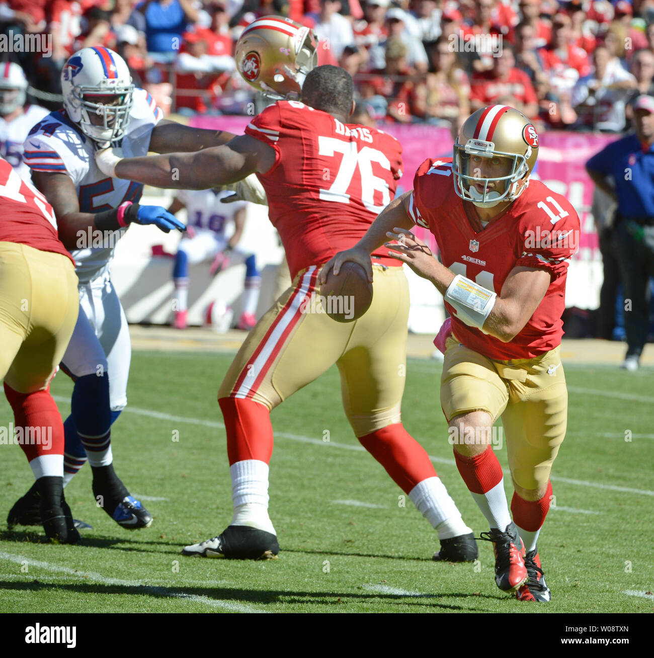 San Francisco 49ers QB Alex Smith (11) has his jersey pulled by Detroit  Lions Ndamukong Suh (90) in the third quarter at Candlestick Park in San  Francisco on September 16, 2012. The