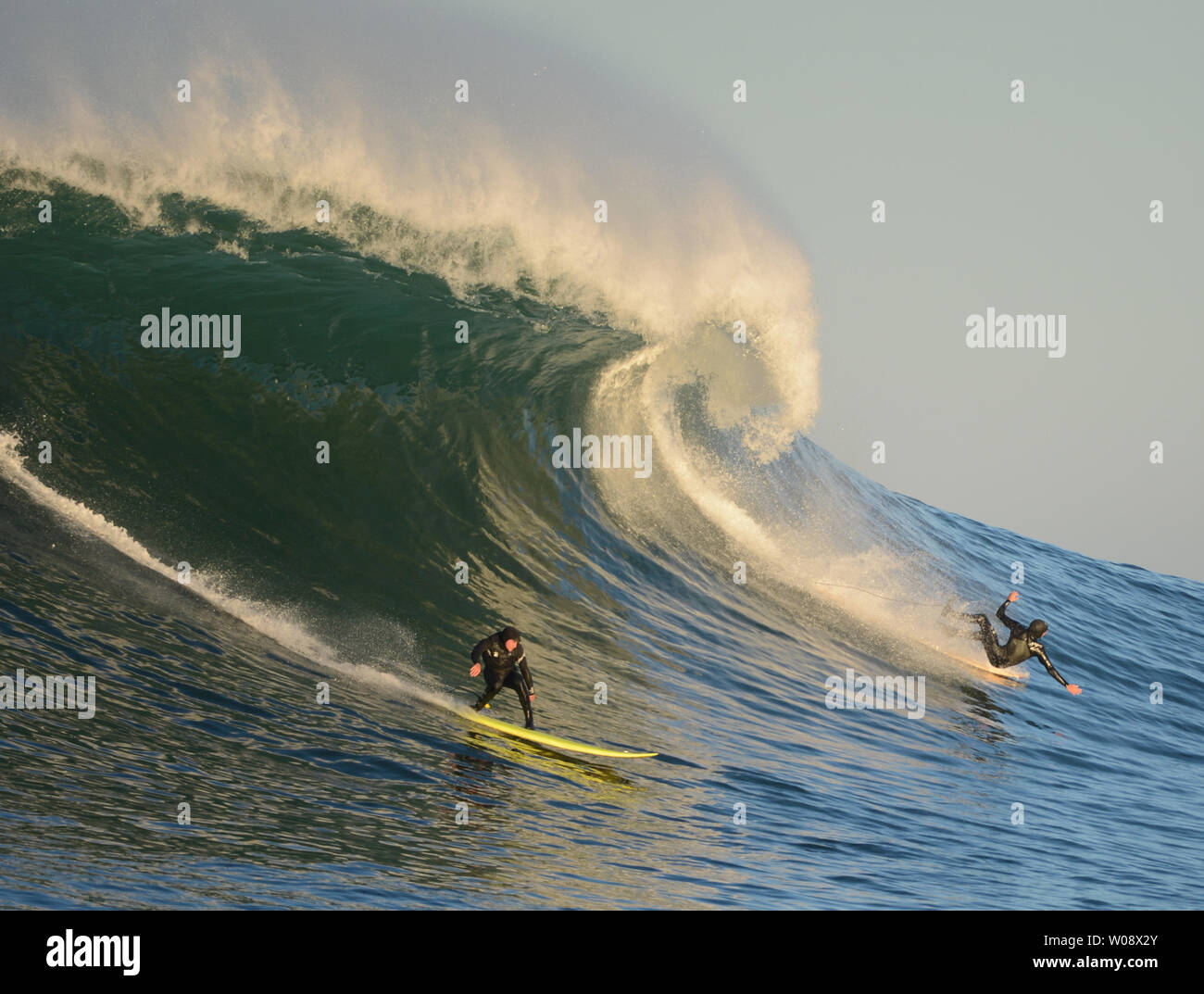 Surfers take warm up runs before the Mavericks Invitational big wave