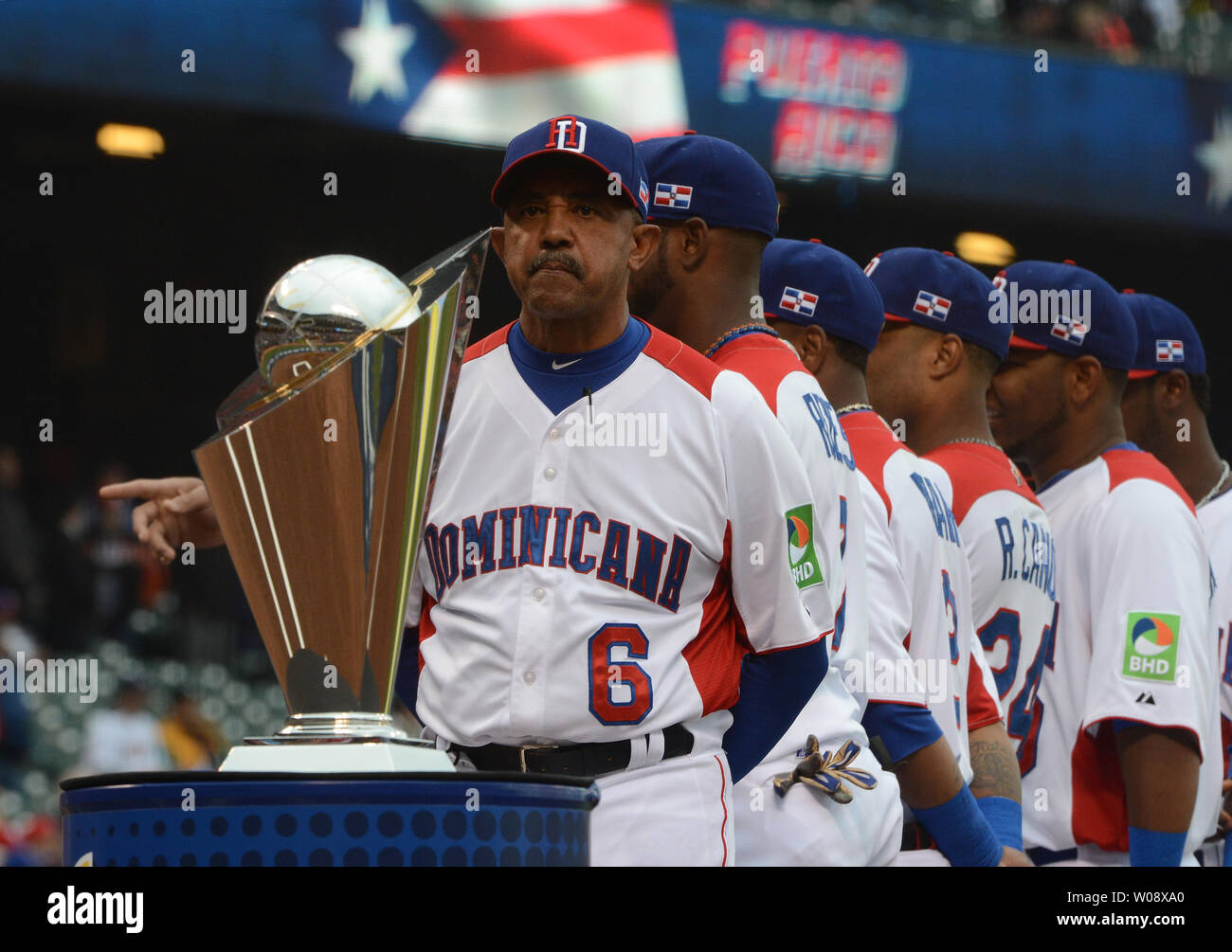 The Dominican Republic national baseball teams parades onto the field