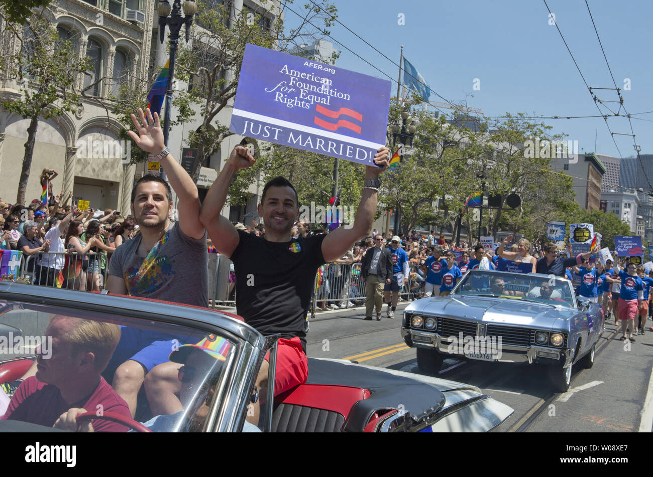 Proposition 8 lawsuit plaintiffs Paul Katami and Jeff Zarrillo ride along Market Street in the annual LGBT Pride Parade in San Francisco on June 30, 2013. Hundreds of thousands turned out to celebrate diversity, the Supreme Court decisions, and the resumption of gay marriages in the state of California.   UPI/Terry Schmitt Stock Photo