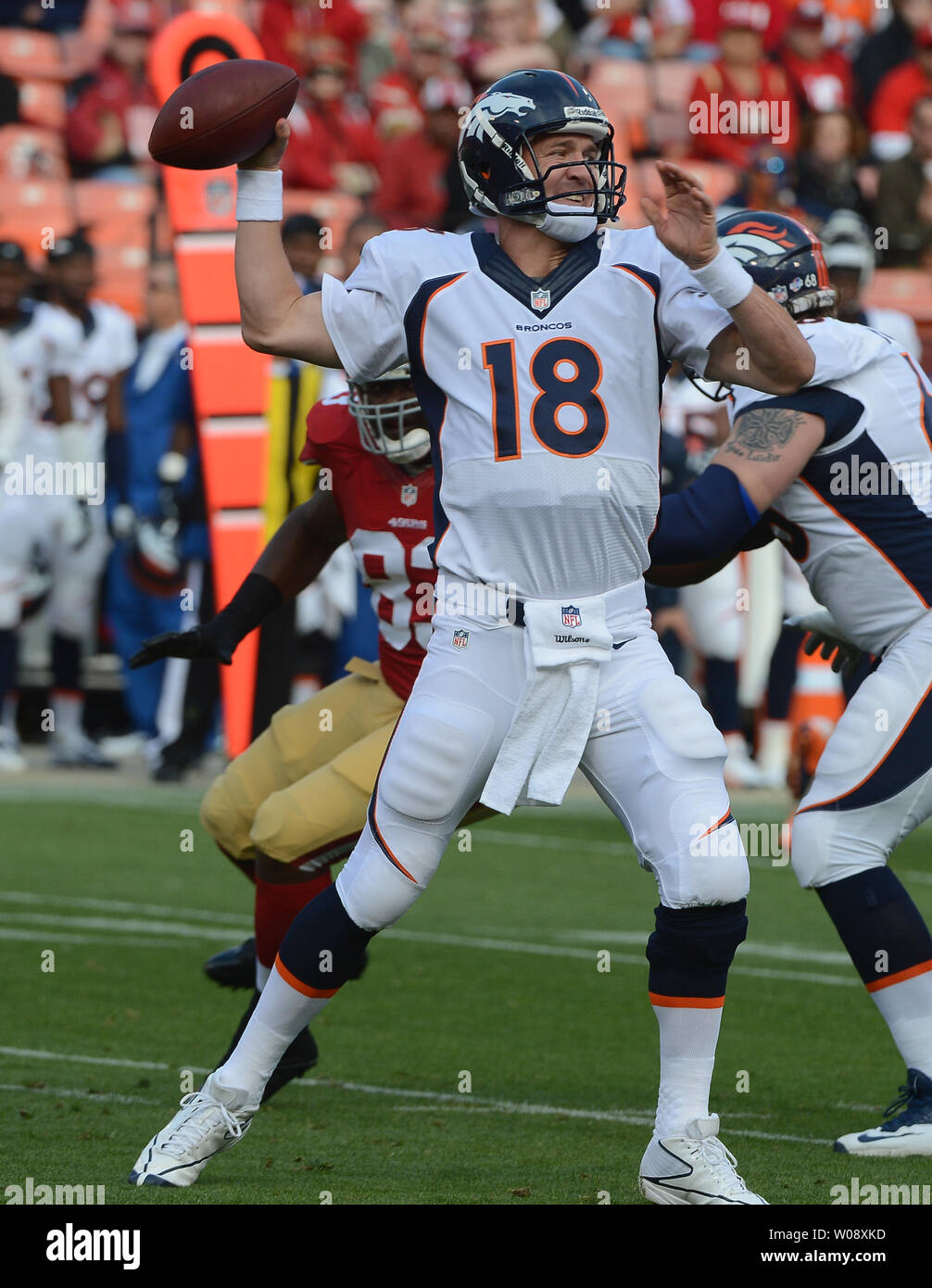 Denver Broncos QB Peyton Manning (18) passes against the San Francisco 49ers in a preseason game at Candlestick Park in San Francisco on August 8, 2013. The Broncos defeated the 49ers 10-6.      UPI/Terry Schmitt Stock Photo