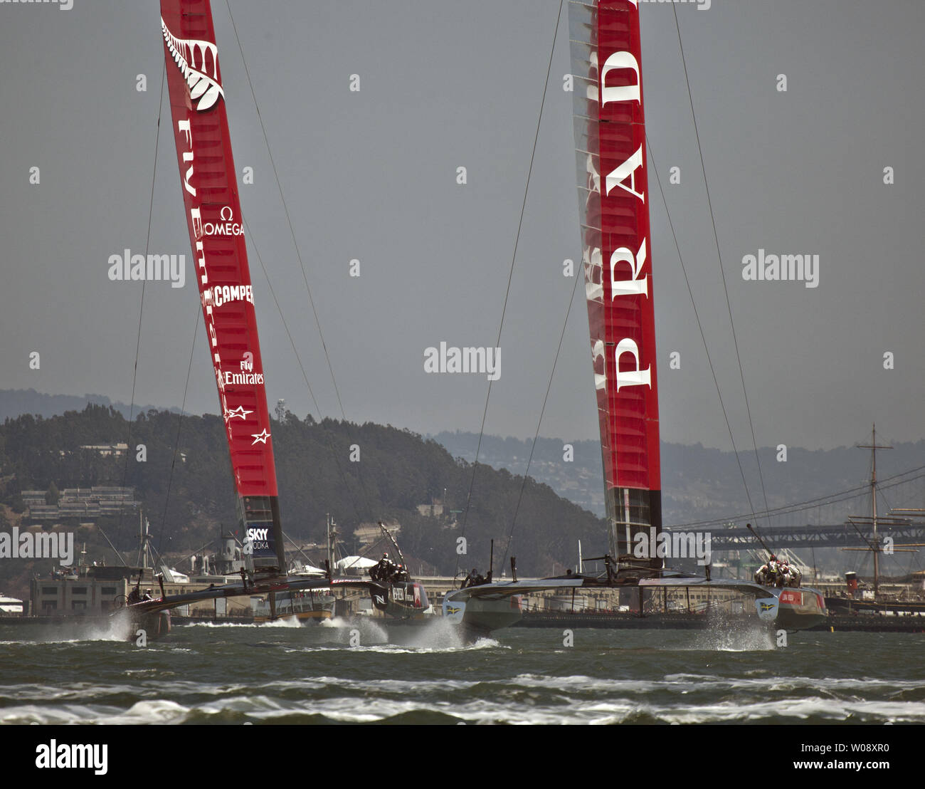 Emirates New Zealand (L) leads Italy's Luna Rossa Challenge in race five of the finals of the Louis Vuitton Cup in San Francisco Bay on August 21, 2013. The winner of the best of 13 races will face Oracle USA in the America's Cup. The Kiwis won both races of the day.   UPI/Terry Schmitt Stock Photo