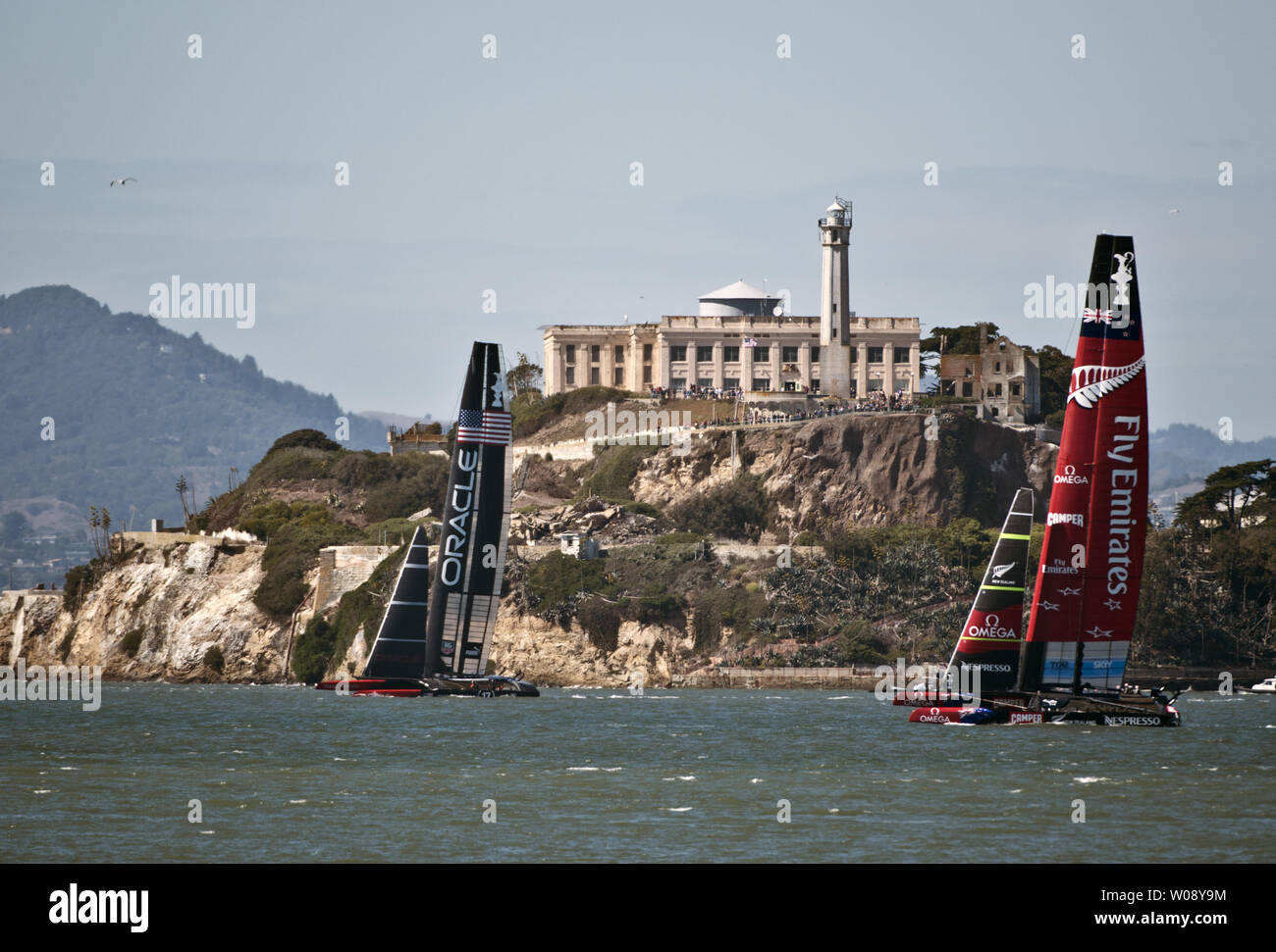 Oracle Team USA sails upwind ahead of Emirates New Zealand (R) in race 15 of the America's Cup Regatta on San Francisco Bay on September 22, 2013. The Americans won races 14 and 15 to bring the score to 8-5 in favor of the Kiwis.  UPI/Terry Schmitt Stock Photo