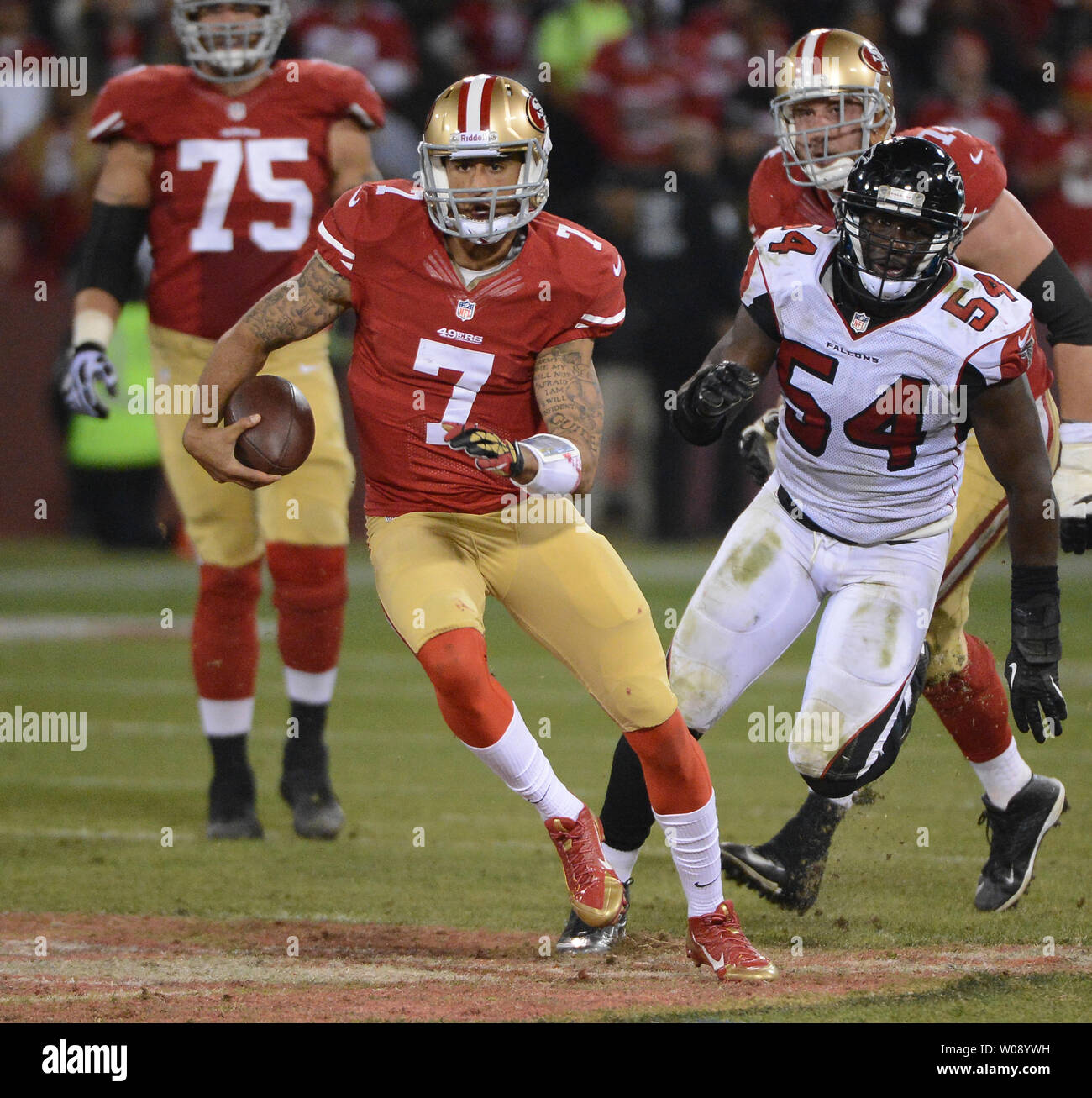San Francisco 49ers QB Colin Kaepernick (7) scrambles for 22 yards in the  third quarter against the Atlanta Falcons at Candlestick Park in San  Francisco on December 23, 2013. The 49ers defeated