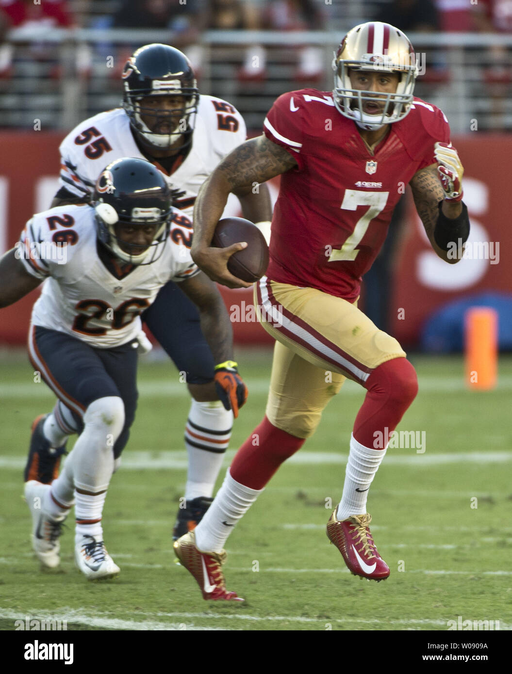 San Francisco 49ers QB Colin Kaepernick runs against the Chicago Bears in the second quarter at Levi's Stadium in Santa Clara, California on September 14, 2014. UPI/Terry Schmitt Stock Photo