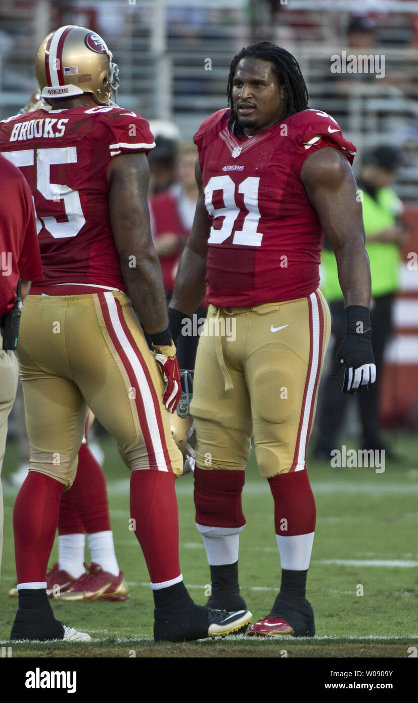 San Francisco 49ers defensive tackle Ray McDonald removes his helmet during a time out while playing the Chicago Bears at Levi's Stadium in Santa Clara, California on September 14, 2014. California Lieutenant Governor and former San Francisco Mayor Gavin Newsome has called on the 49ers to bench McDonald pending the outcome of his felony domestic violence investigation by San Jose law enforcement. UPI/Terry Schmitt Stock Photo