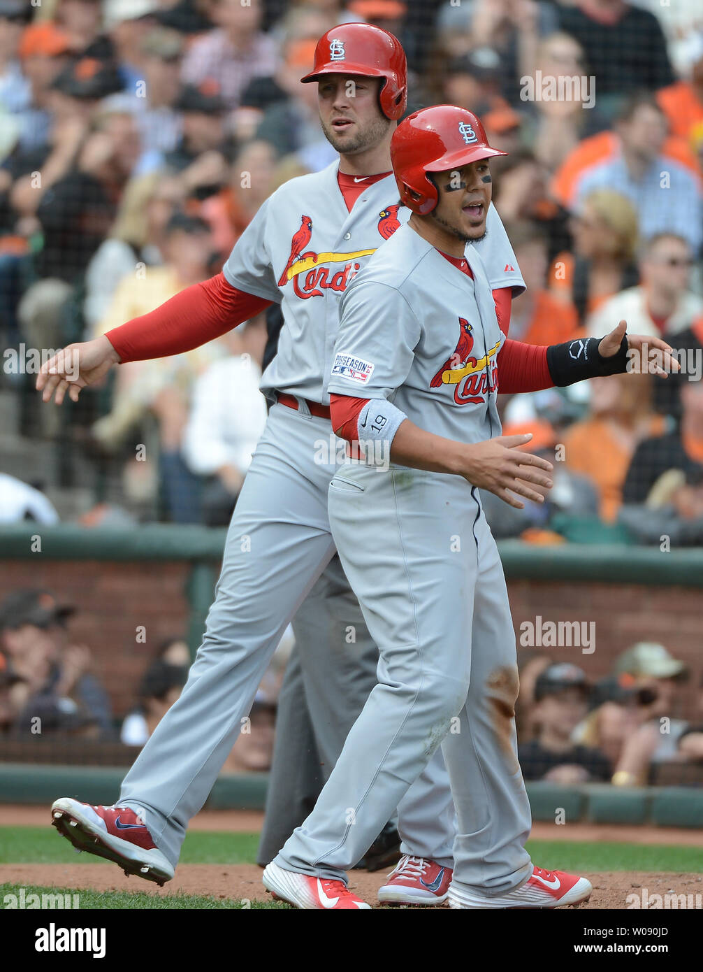 Jon Jay of the St. Louis Cardinals, left, celebrates with teammate