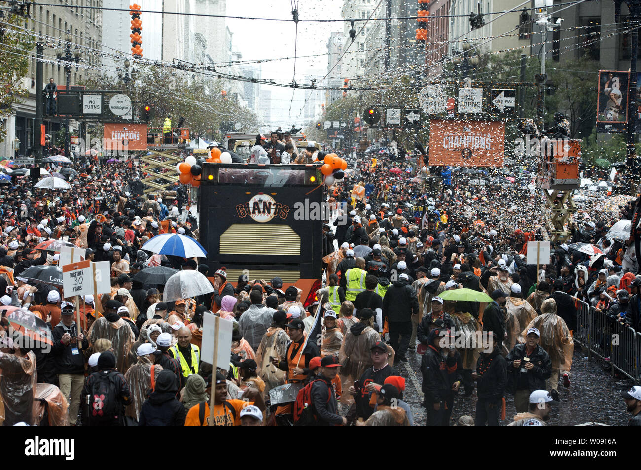 San Francisco Giants employees and players jam Market Street at the World  Series Parade in San Francisco on October 31, 2014. The Giants defeated the Kansas  City Royals in game 7 to
