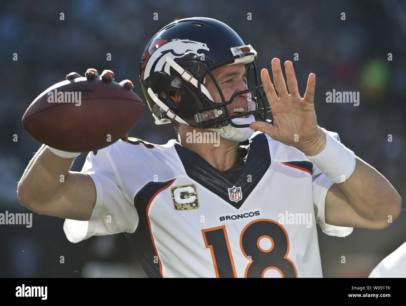 Denver Broncos Peyton Manning warms up for the third quarter against the Oakland Raiders at O.co Coliseum in Oakland, California on November 9, 2014. The Broncos defeated the winless Raiders 41-17.     UPI/Terry Schmitt Stock Photo