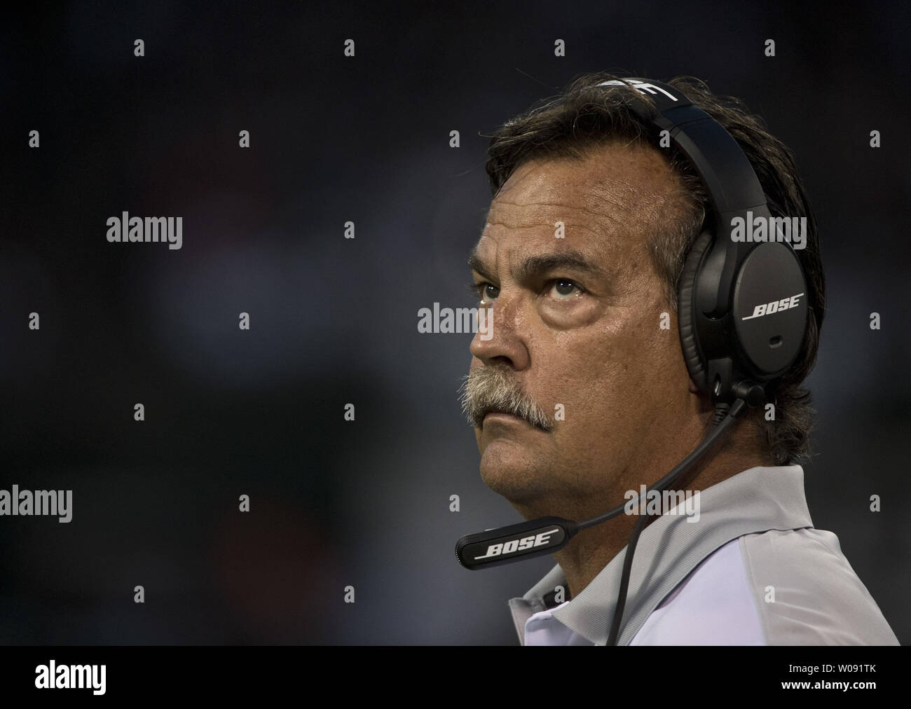 St. Louis Rams head coach Jeff Fisher looks to the scoreboard in the first quarter as the Rams play the Oakland Raiders in a pre-season game at O.co Coliseum in Oakland, California on August 14, 2015. The Raiders defeated the Rams  18-3.       Photo by Terry Schmitt/UPI Stock Photo