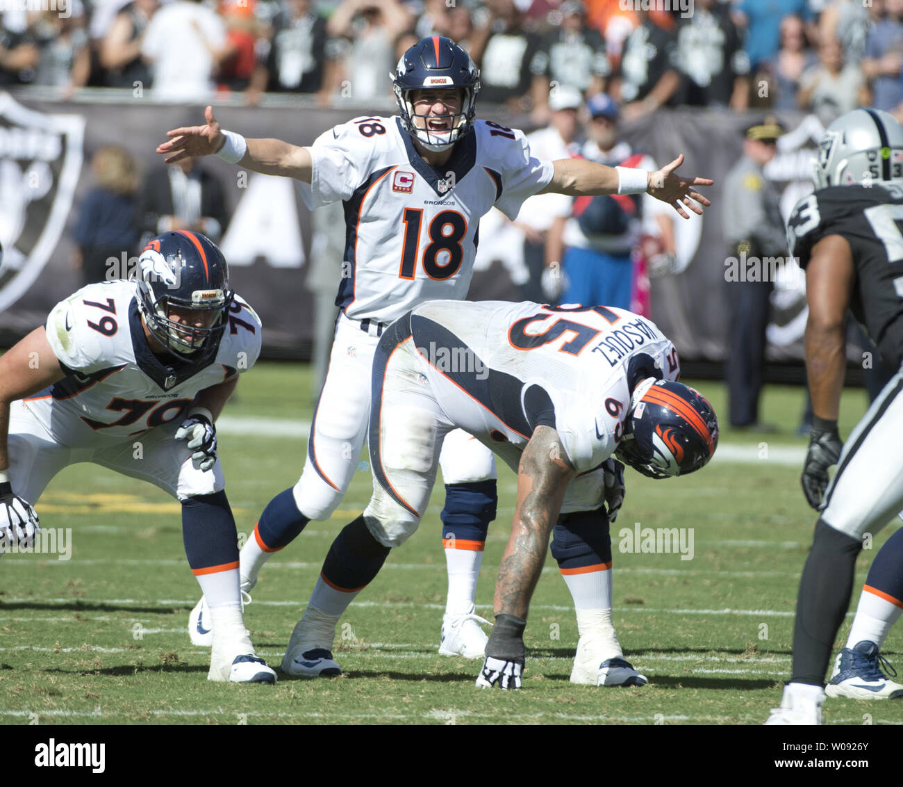 Denver Broncos QB Peyton Manning changes the call at the line in the second quarter against the Oakland Raiders at O.co Coliseum in Oakland, California on October 11, 2015. The Broncos defeated the Raiders 16-10.  Photo by Terry Schmitt/UPI Stock Photo