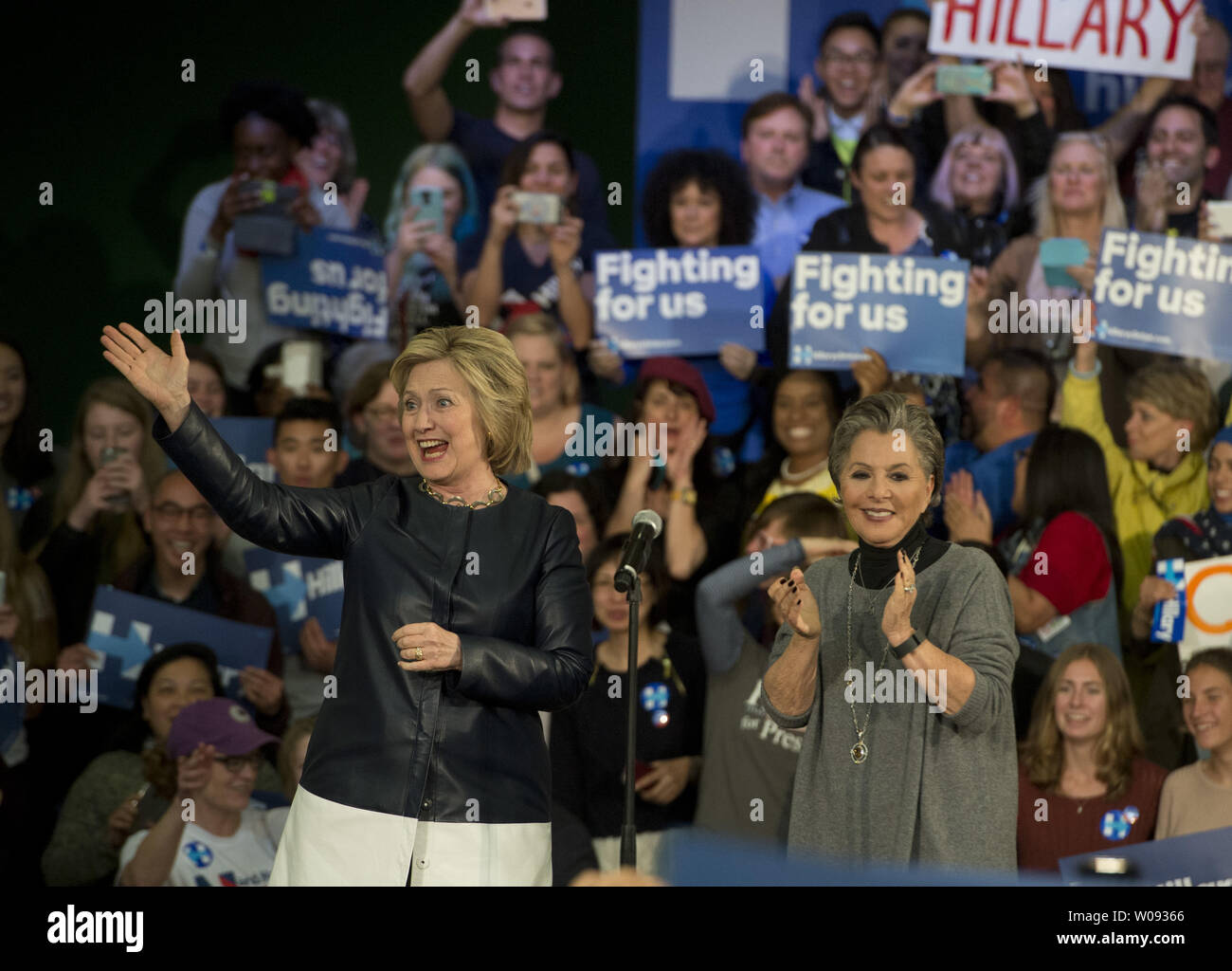 Democratic presidential hopeful Hillary Rodham Clinton (L) greets supporters with Senator Barbara Boxer (D-CA) at La Escuelita School in Oakland, California on May 6, 2016. Clinton told the crowd, ÒI will do everything I can to make sure the presumptive nominee of the Republican Party never gets near the White House.Ó     Photo by Terry Schmitt/UPI Stock Photo