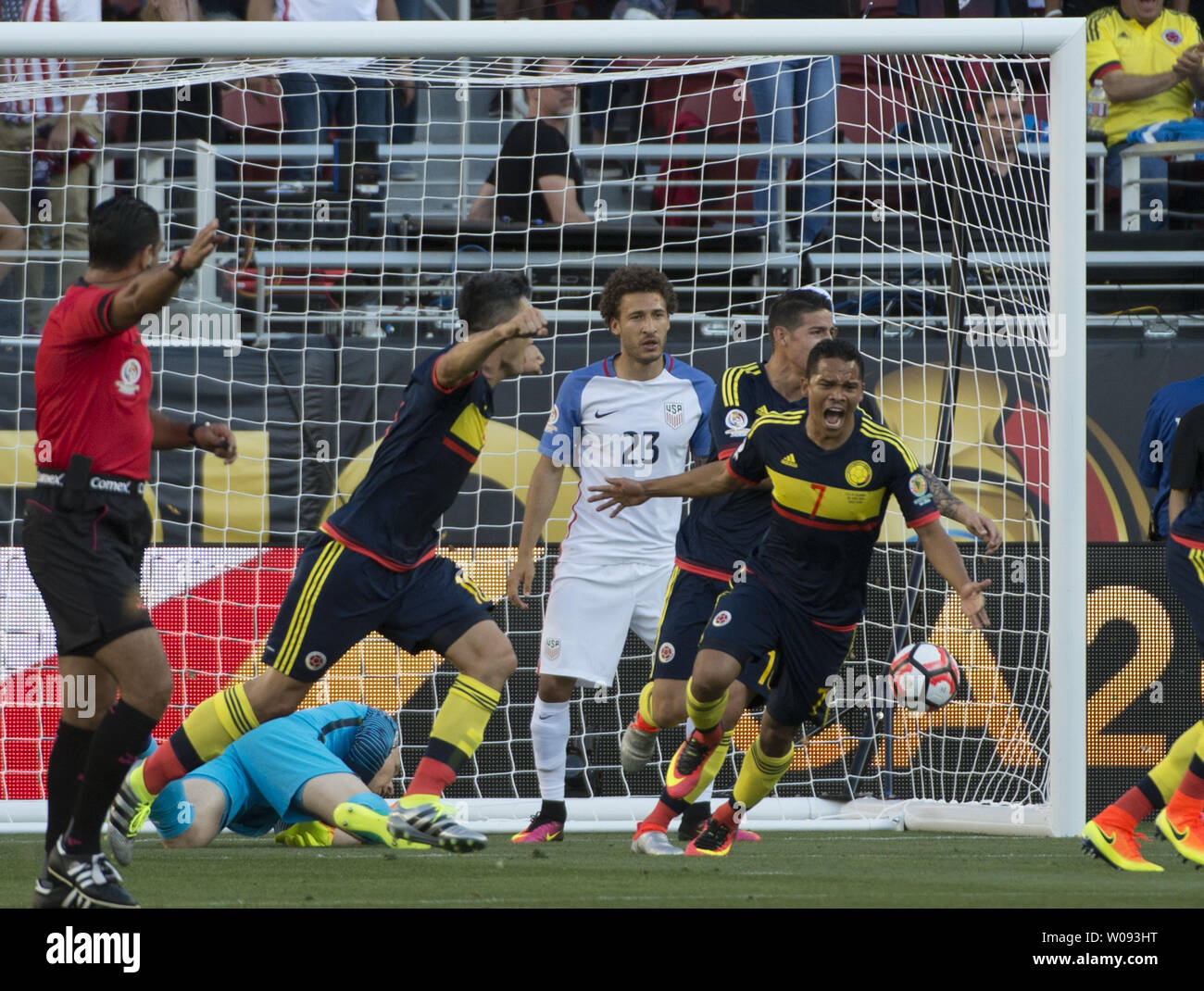 Colombia's Carlos Bacca (7) leads the celebration after Cristian Zapata scored as USA's goalie Brad Guzan lies prone in the first half at COPA America Centenario at Levi's Stadium in Santa Clara, California on June 3, 2016.  Colombia won 2-0.   Photo by Terry Schmitt/UPI Stock Photo