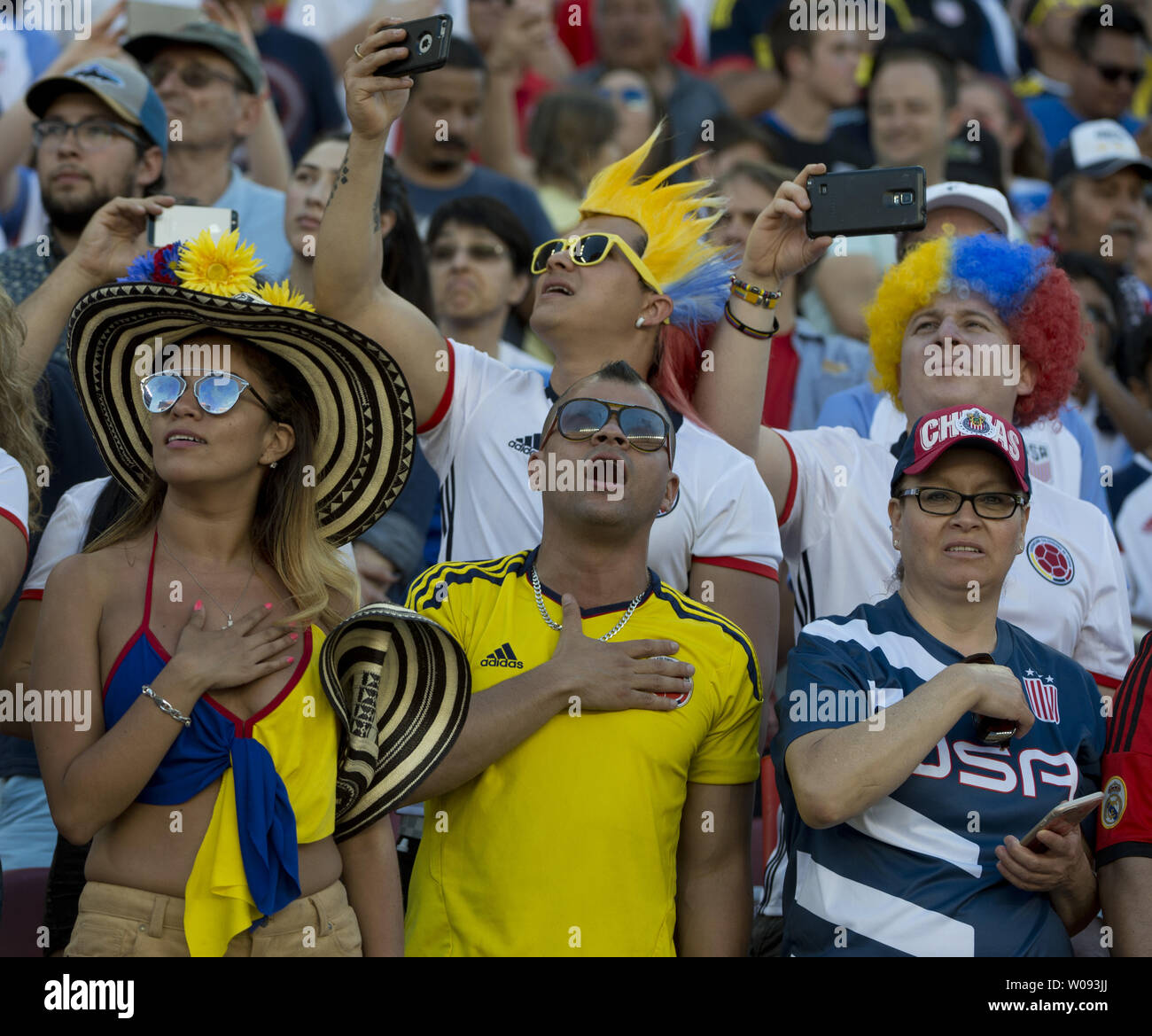 Soccer fans sing the Colombian national anthem before a match against the  USA at COPA America Centenario at Levi's Stadium in Santa Clara, California  on June 3, 2016. Colombia won 2-0. Photo