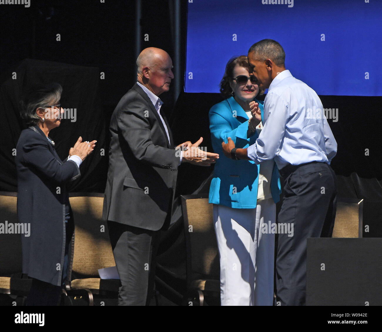 President Barack Obama greets (L-R) Sen. Barbara Boxer, California Gov. Jerry Brown, and Sen. Dianne Feinstein at the 20th annual Lake Tahoe Summit in Stateliness, Nevada on August 31, 2016. The summit brings together people from California and Nevada to address the problems of the lake.    Photo by Terry Schmitt/UPI Stock Photo