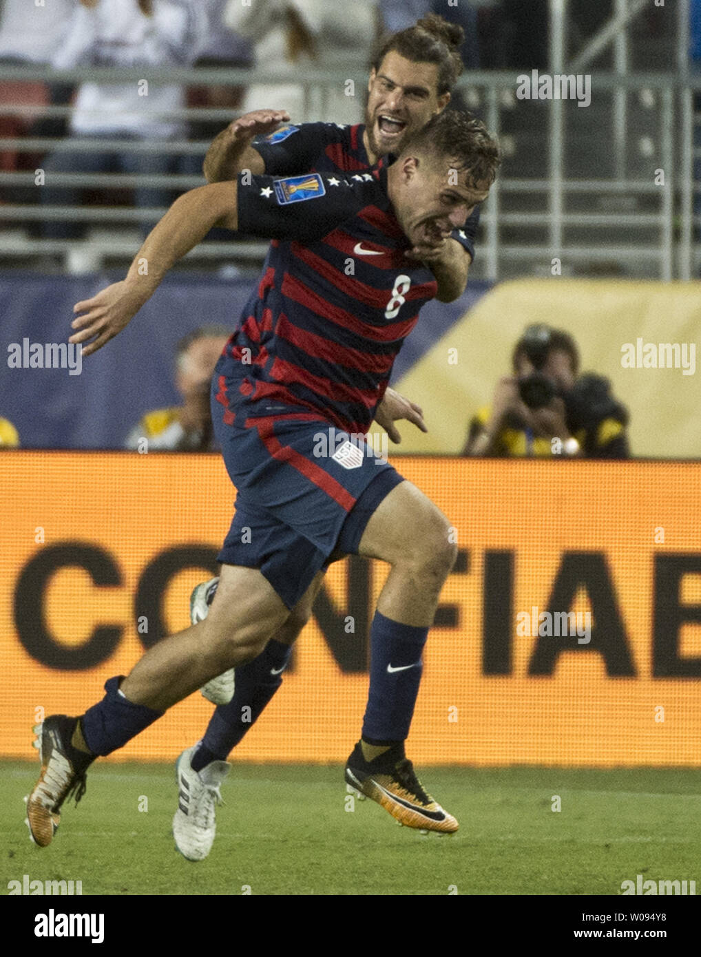 Graham Zusi congratulates USA's Jordan Morris (8) after a goal against Jamaica in the second half of the finals of the CONCACAF Gold Cup at Levi's Stadium in Santa Clara on July 26, 2017. The goal proved to be the winning margin as the USA defeated Jamaica 2-1.    Photo by Terry Schmitt/UPI Stock Photo