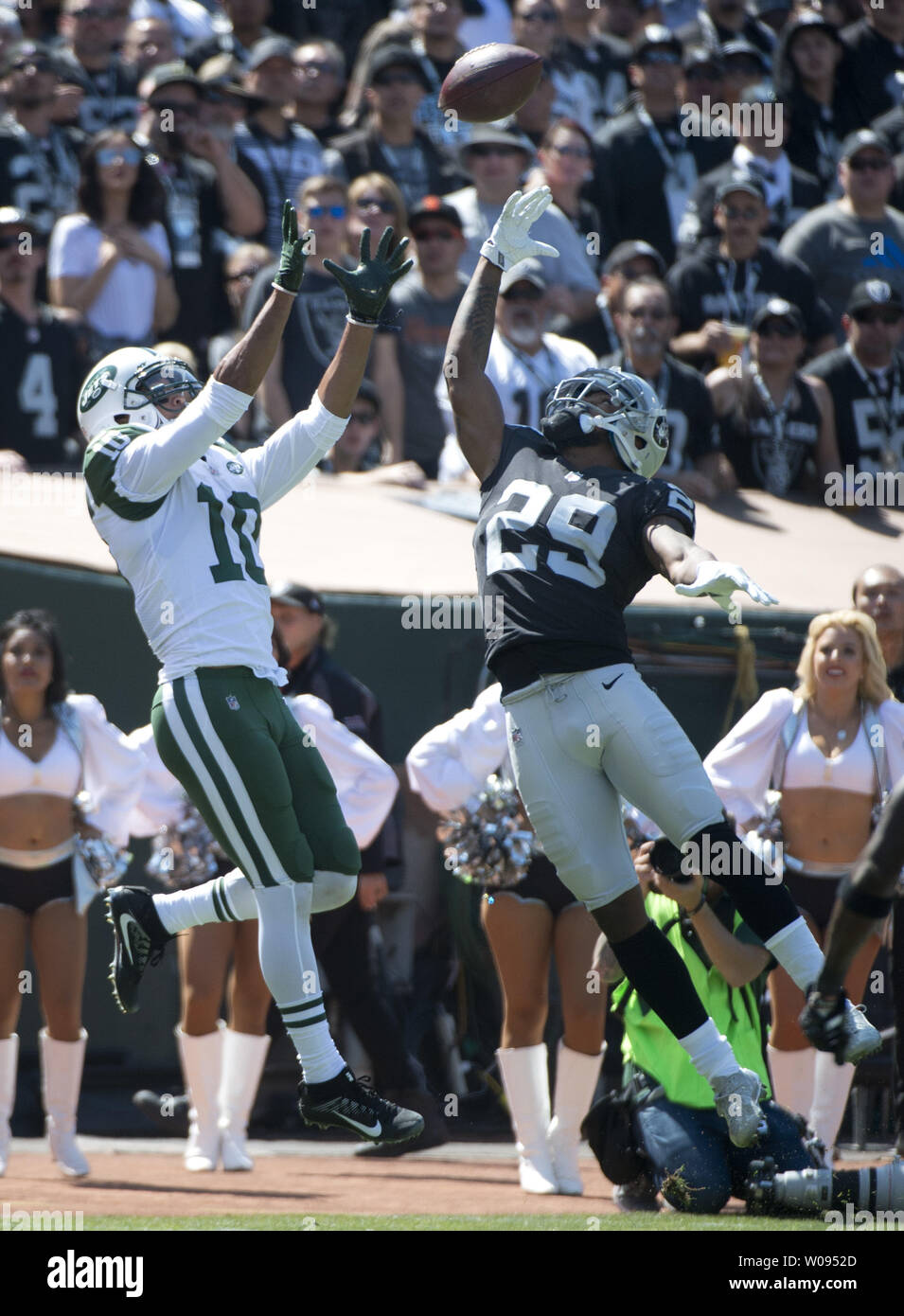 New York Jets Jermaine Kearse (10) goes up for a 34 yard TD pass from QB Josh McCown as Oakland Raiders David Amerson (29) tries to defend in the second quarter at the Coliseum in Oakland, California on September 17, 2017. The Raiders defeated the Jets 45-20.    Photo by Terry Schmitt/UPI Stock Photo