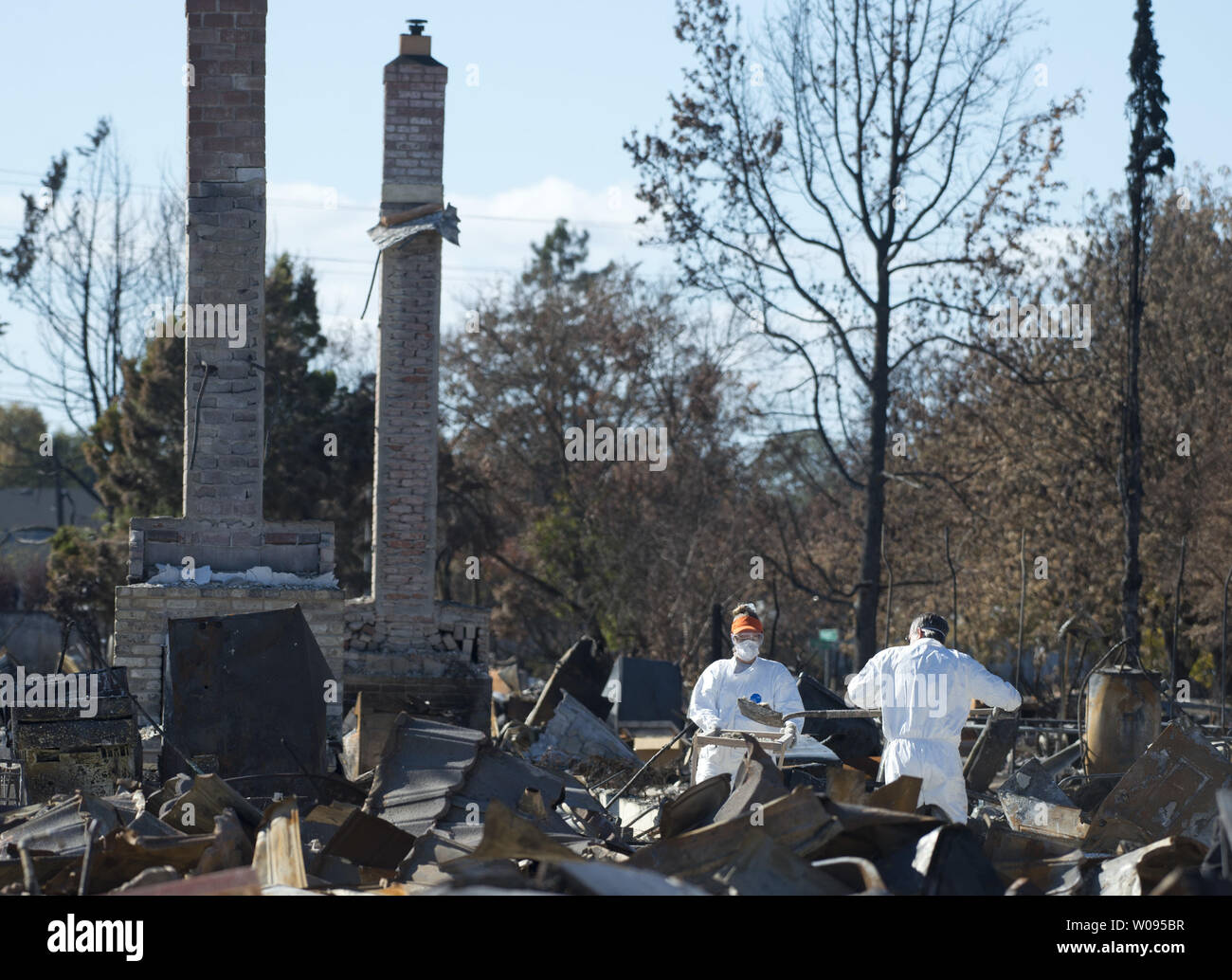 Residents search through the ruins in the Coffey Park area of Santa Rosa California, California on October 21, 2017. Residents are returning to salvage what they can from an area leveled by firestorm early October 9.    Photo by Terry Schmitt/UPI Stock Photo