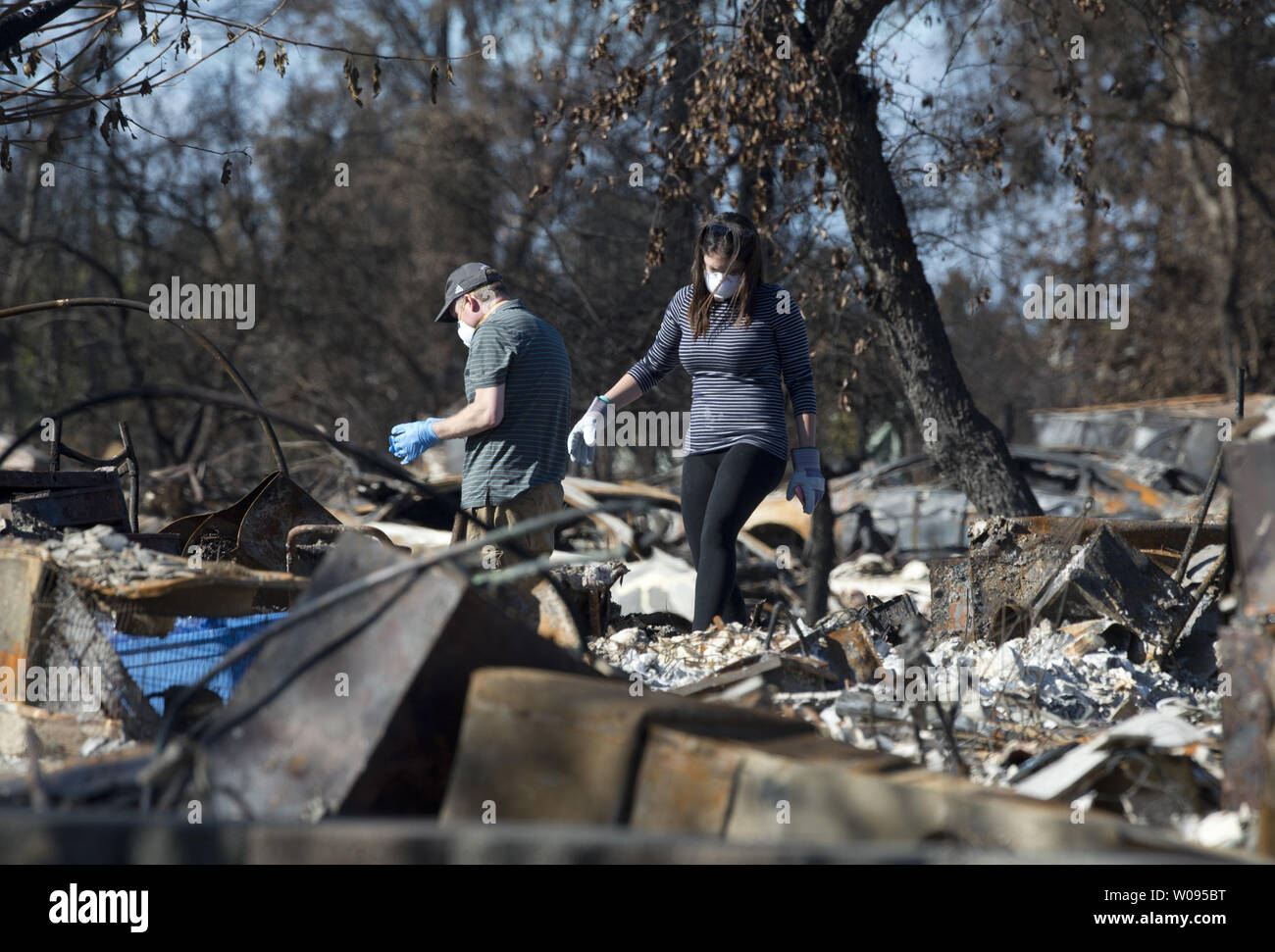 Residents search through the ruins in the Coffey Park area of Santa Rosa California, California on October 21, 2017. Residents are returning to salvage what they can from an area leveled by firestorm early October 9.    Photo by Terry Schmitt/UPI Stock Photo