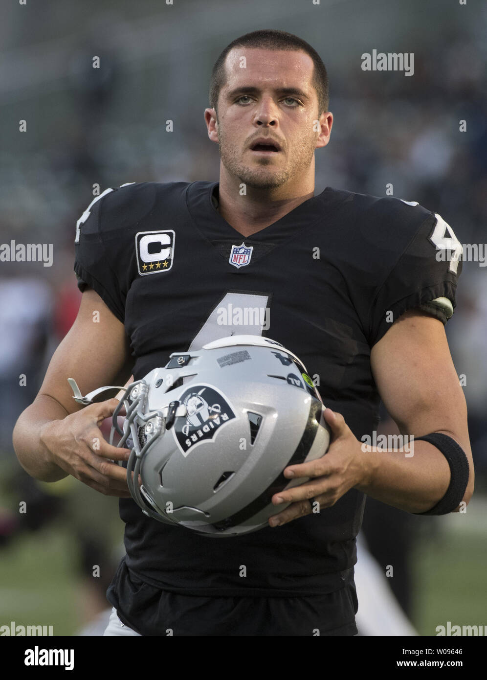 Oakland Raiders Derek Carr readies to play the Los Angeles Rams at the Coliseum in Oakland, California on Monday, September 10, 2018. The Rams defeated the Raiders 33-13.       Photo by Terry Schmitt/UPI Stock Photo