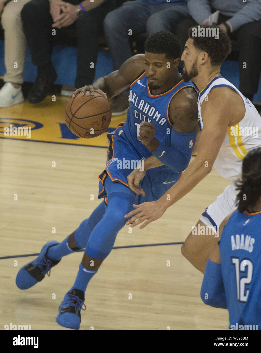 Oklahoma City Thunder Forward Paul George (L) Tries To Drive On Golden  State Warriors Guard Klay Thompson In The First Quarter At Oracle Arena In  Oakland, California On October 16, 2018. The
