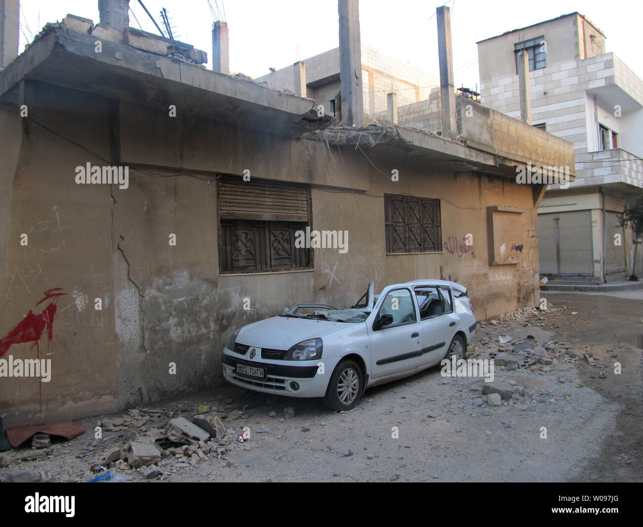 A damaged car is seen in Bab Amro in the city of Homs, Syria on February 14, 2012. Syrian government forces renewed their assault on the rebellious city of Homs Tuesday in what activists described as the heaviest shelling in days, as the U.N. human rights chief raised fears of civil war. UPI Stock Photo