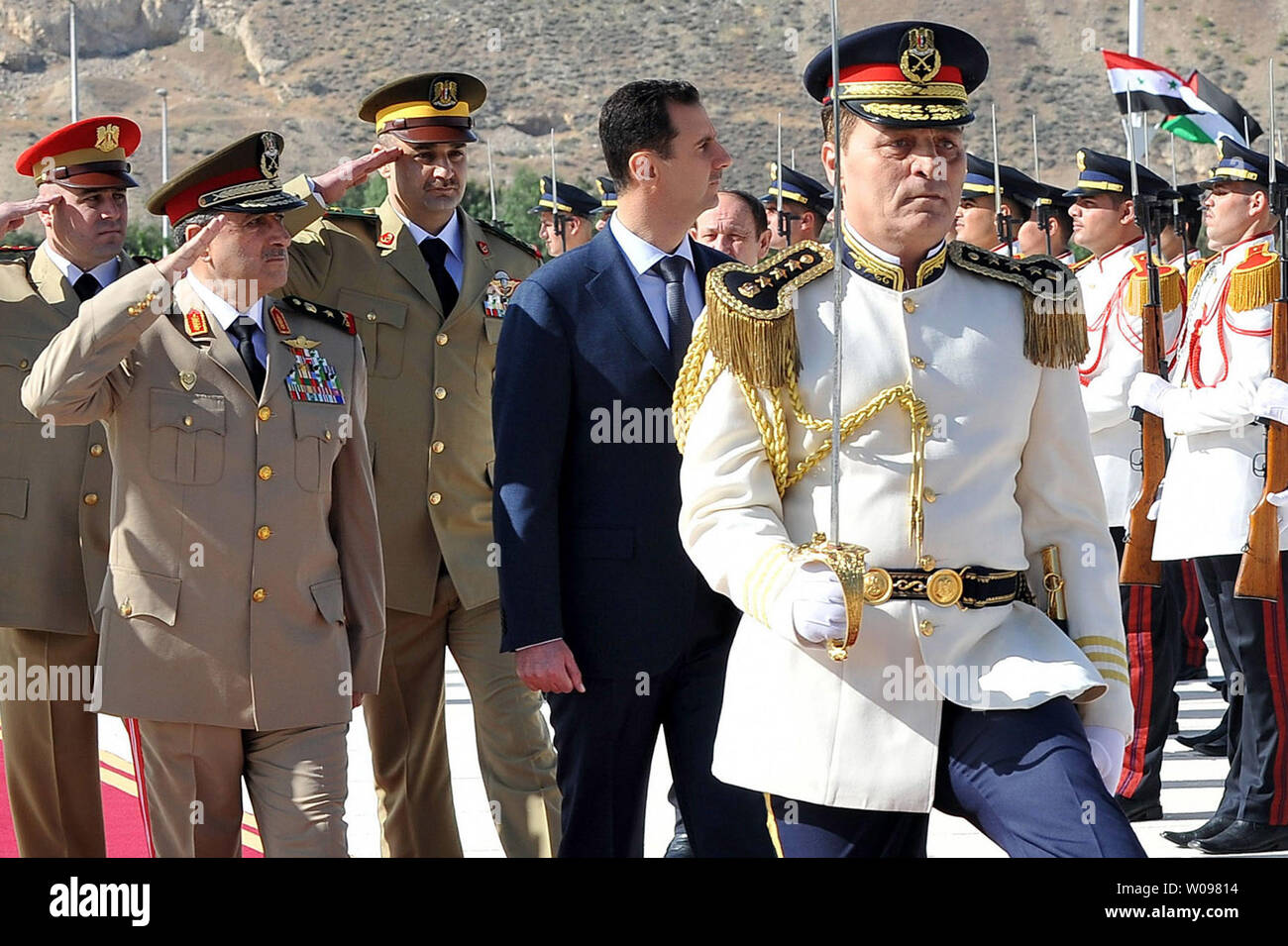 A picture dated May 6, 2011 and released by the Syrian Arab News Agency (SANA) shows Syrian President Bashar al-Assad (4R), Minister of Defense, Lieutenant General Daoud Rajha (2L), attending a ceremony at the tomb of the unknown soldier in Damascus. Syrian President Bashar al-Assad appointed Freij as the new defence minister on July 18, 2012, after Rajha was killed the same day in a suiicde bomb blast that killed two top regime officials. UPI Stock Photo