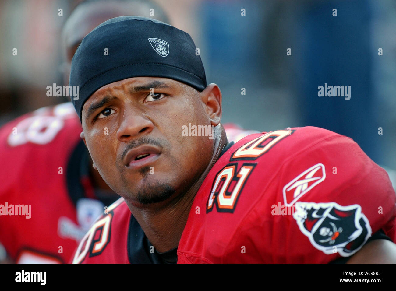 Tampa Bay Buccaneers' saftey Dwight Smith (26) watches a replay from the  sideline during a game against the San Francisco 49ers at Raymond James  Stadium in Tampa, FL on Nov. 21, 2004.