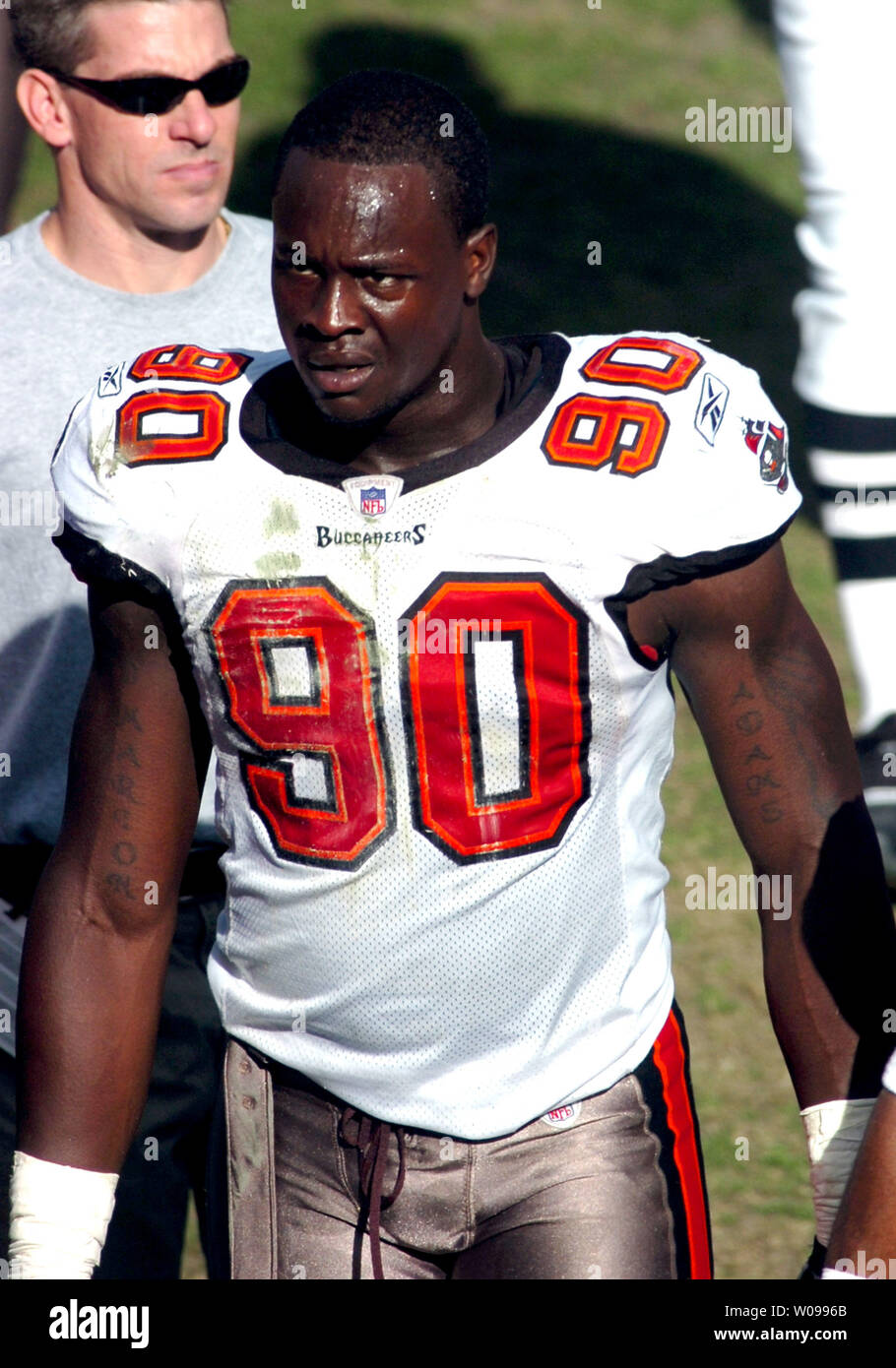 Tampa Bay Buccaneers' defensive end Gaines Adams (90) walks off the field at halftime at Raymond James Stadium in Tampa, Florida on January 6, 2008 in the first-round NFC Wildcard playoff game against the New York Giants. The Giants beat the Buccaneers 24-14.   (UPI Photo/Cathy Kapulka). Stock Photo