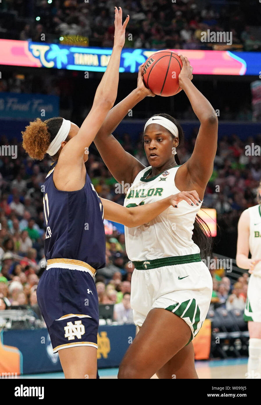 Baylor Lady Bears center Kalani Brown (21) rebounds the ball against Notre Dame Fighting Irish forward Brianna Turner (11) in the first half of the 2019 NCAA Women's Basketball National Championship at the Amalie Arena in Tampa, Florida on April 7, 2019. Photo by Kevin Dietsch/UPI Stock Photo