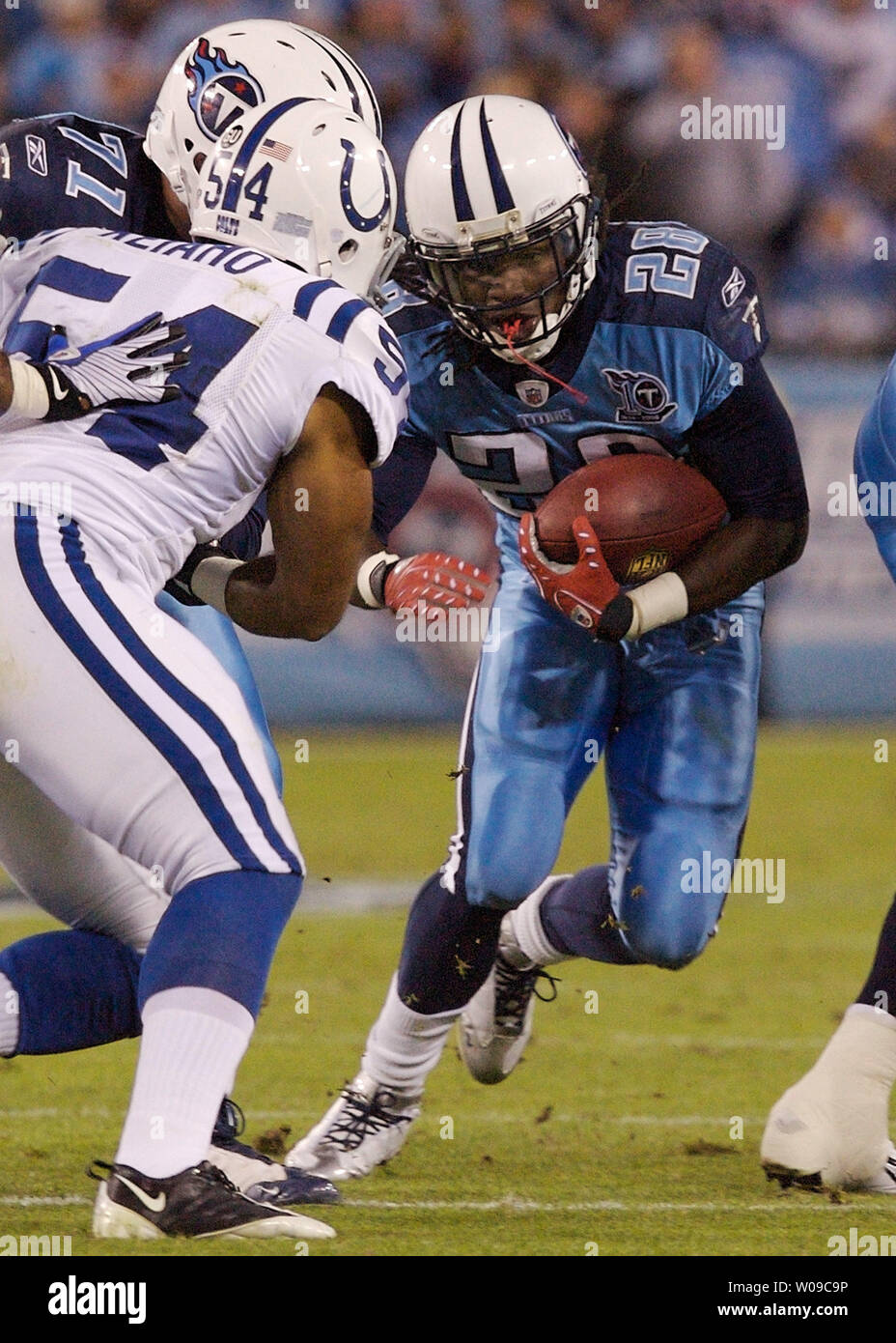 Tennessee Titans running-back Chris Johnson (28) carries the ball