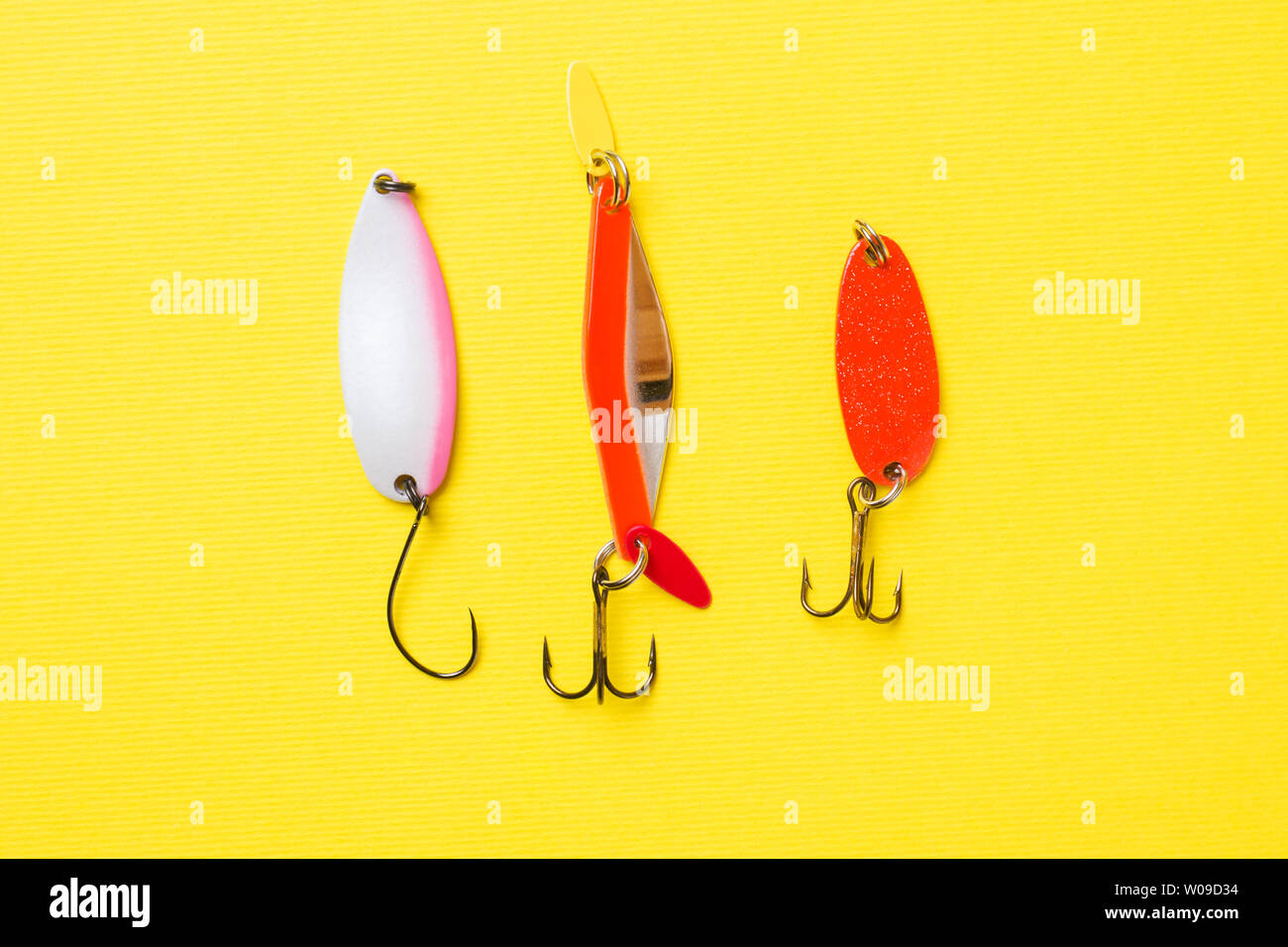 Artificial bait for fishing with hooks and sinkers on wood, for