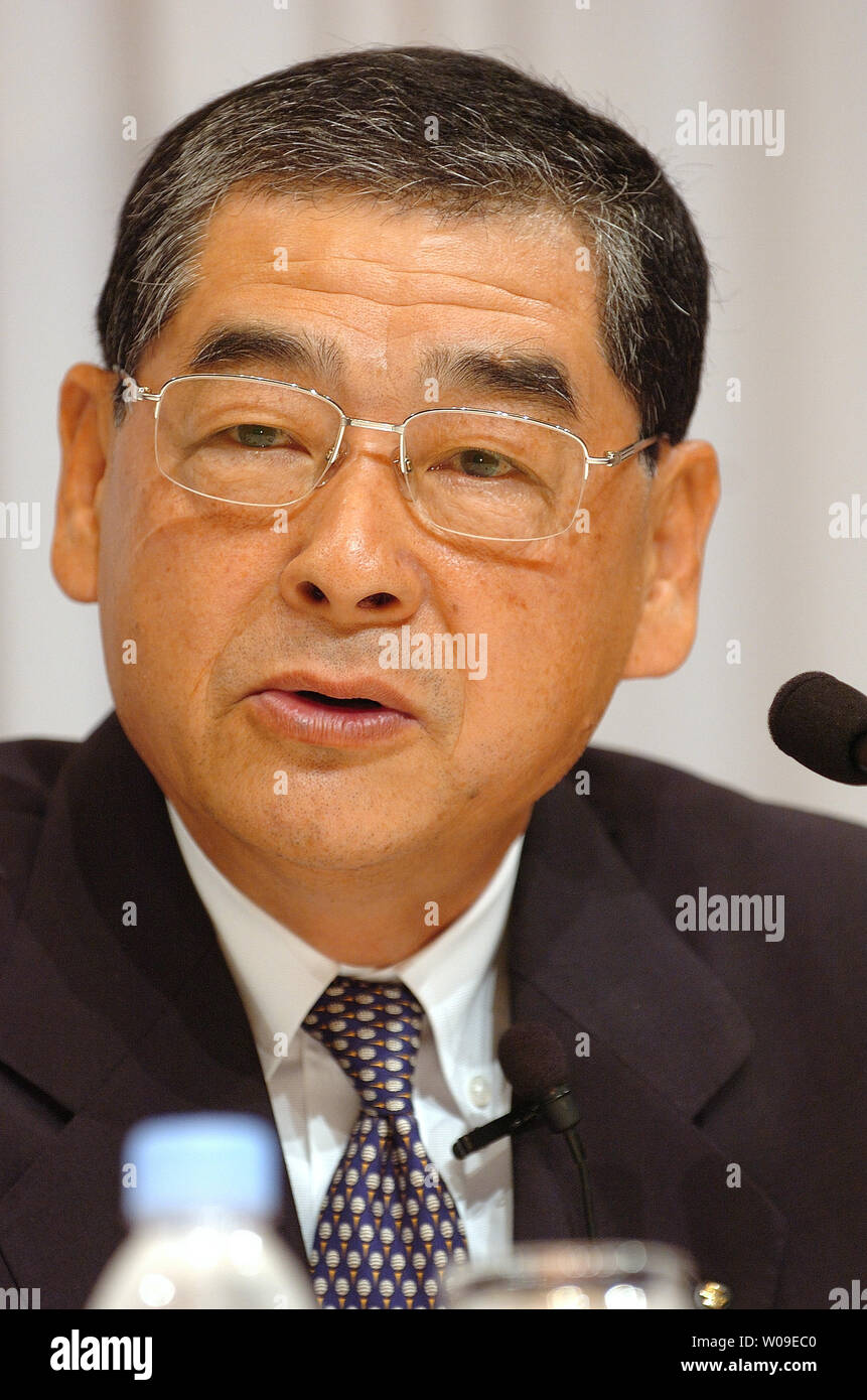 Hiroshi Tsuda, President and COO of the Suzuki Motor Co., Ltd.,speaks to reporters in Tokyo, Japan, June 2, 2006, explaining his firm's extended cooperation with Nissan Motor Co.,Ltd. in the emerging markets by sharing respective manufacturing facilities. Suzuki's plant in India produce Nissan cars. (UPI Photo/Keizo Mori) Stock Photo