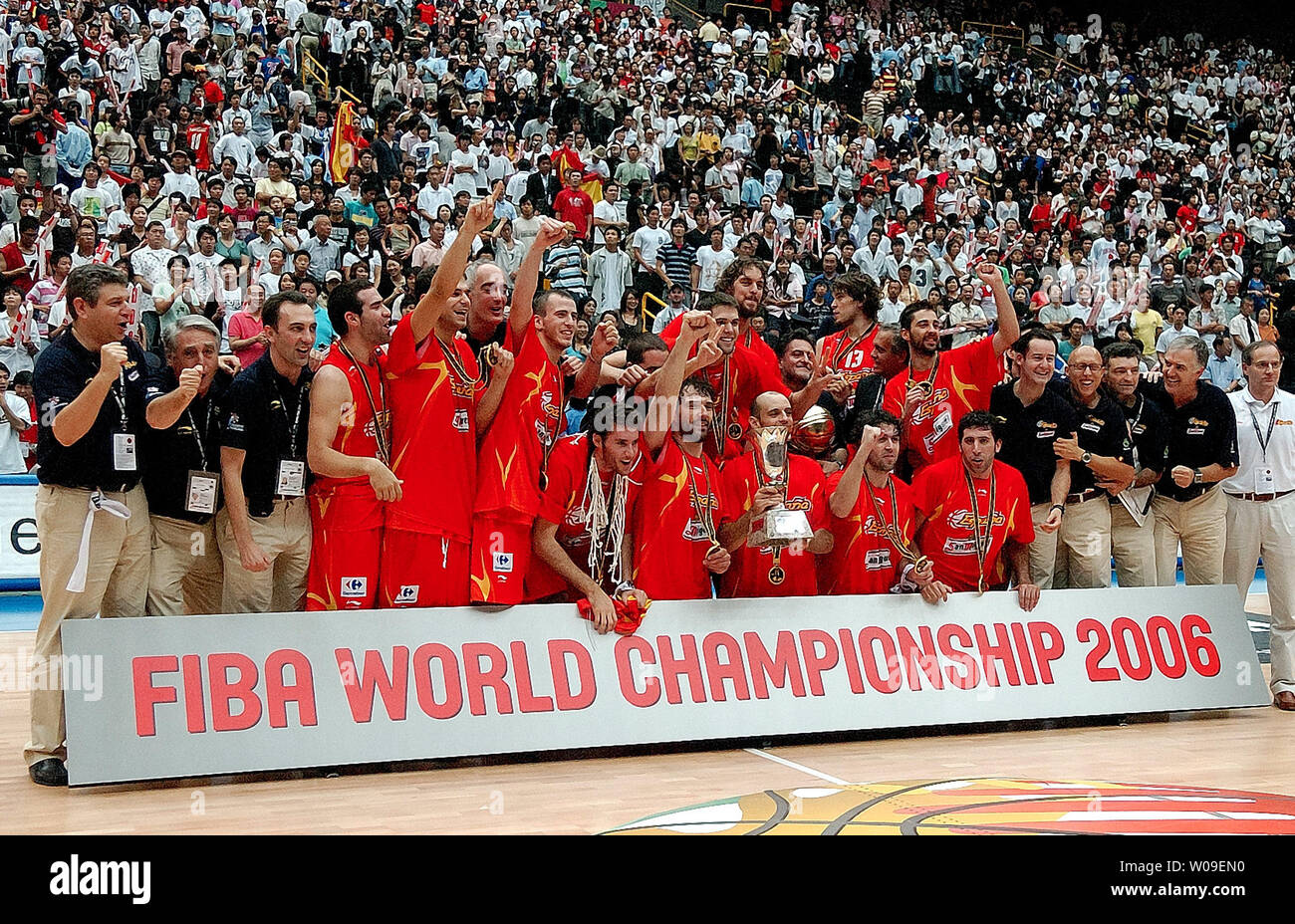 Spanish players with coaches and staff celebrate their gold medal victory in the finals defeating Greece 70-47 at the FIBA World Basketball Championship, in Saitama, Japan on September 3, 2006.  (UPI Photo/Keizo Mori) Stock Photo