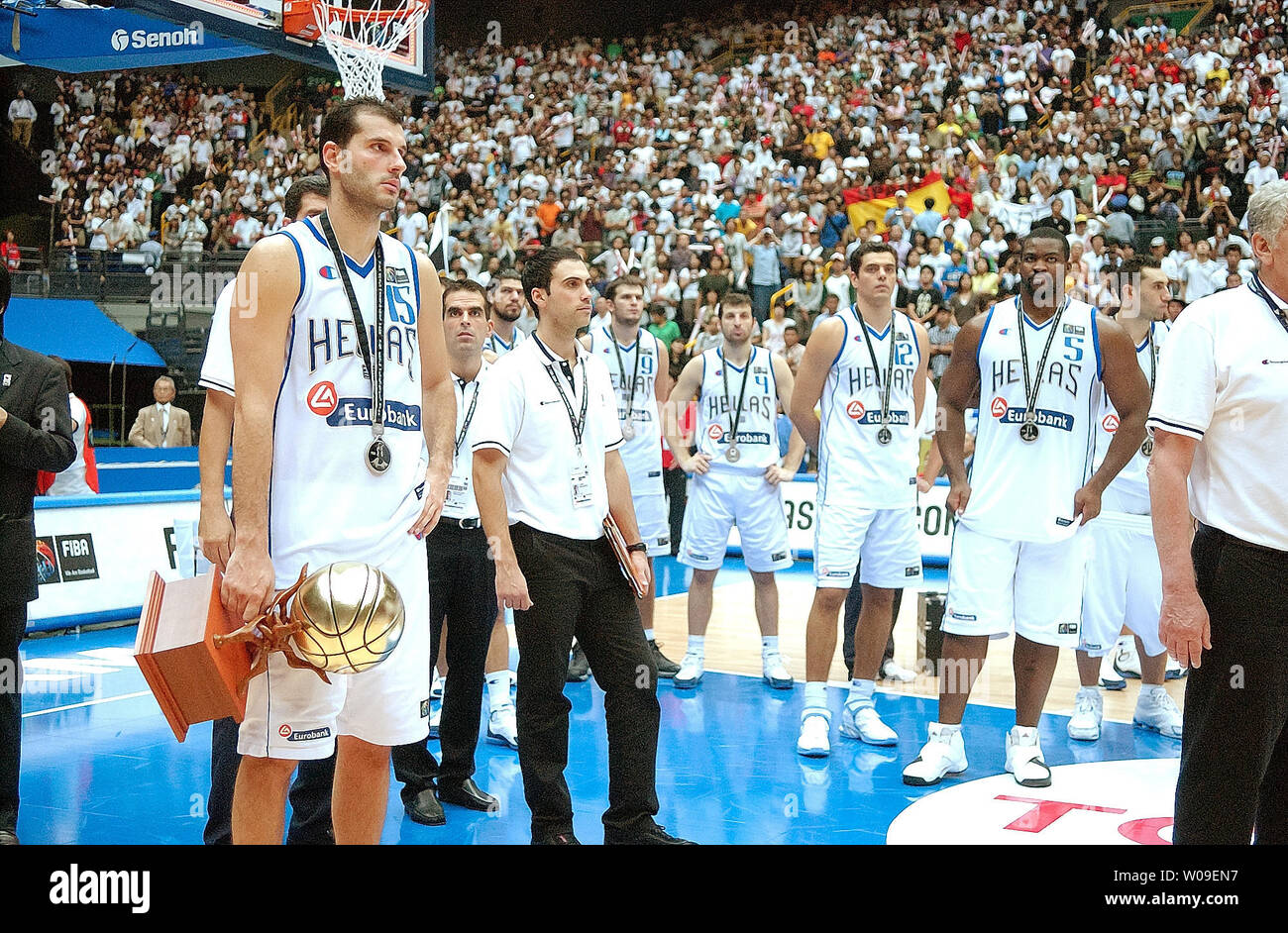Players of Geece stand motionless with a glum look after the awarding ceremony during the FIBA World Basketball Championship, in Saitama, Japan on September 3, 2006. (UPI Photo/Keizo Mori) Stock Photo