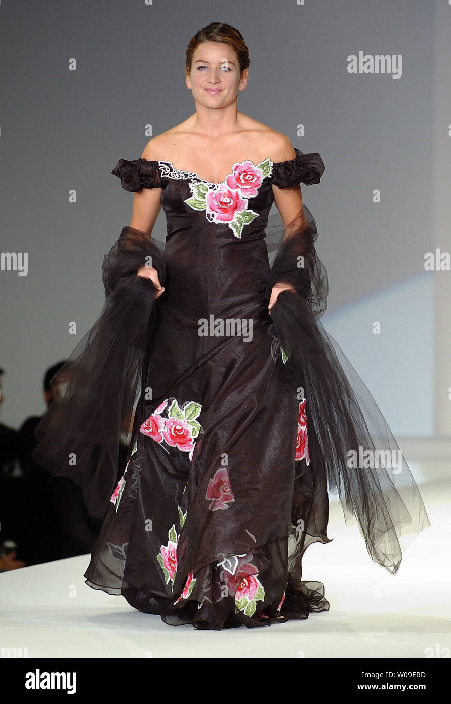 Merete Pedersen, a defender on Denmark's women's national team, walks down the catwalk wearing a creation by Andre Kim during a fashion show as part of the opening ceremony of the 2006 Peace Queen Cup (soccer) in Seoul, South Korea on October 27 2006.    (UPI Photo/Keizo Mori) Stock Photo