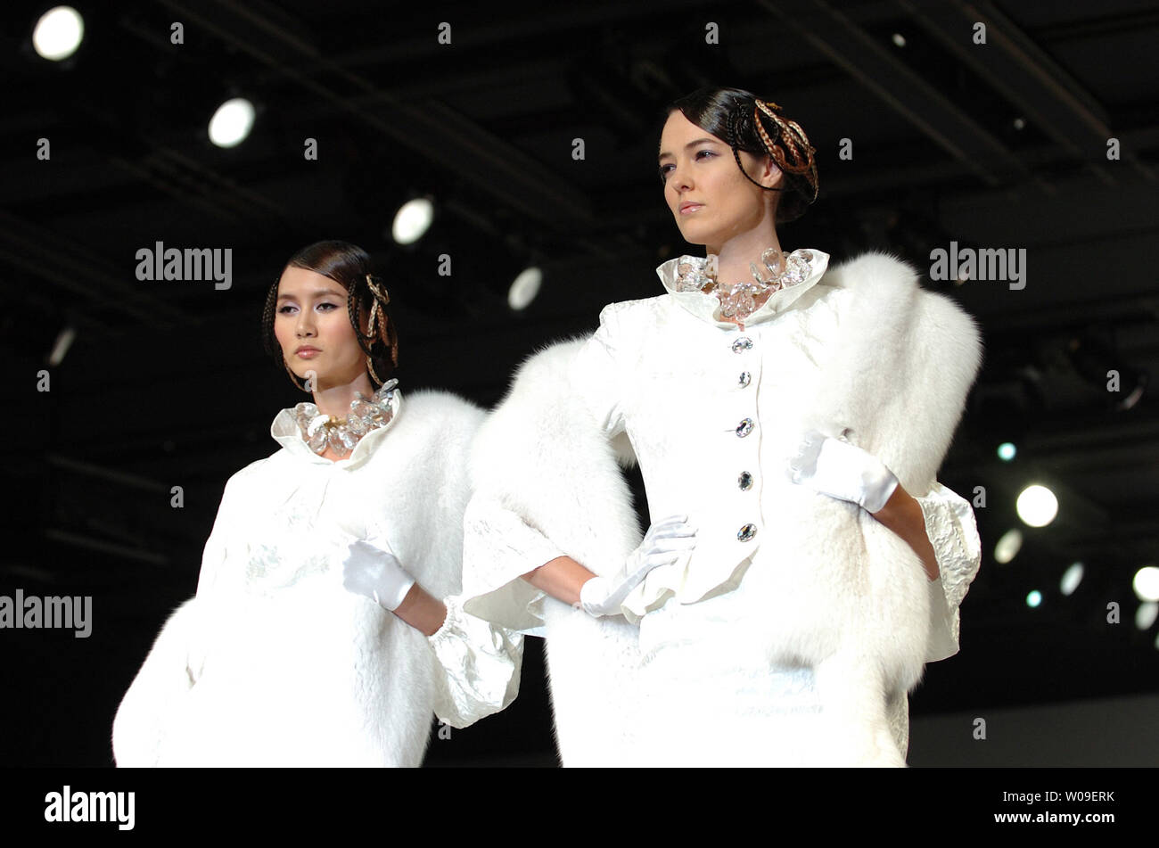 Models walk down the catwalk wearing a creation by Andre Kim during a fashion show as part of the opening ceremony of the 2006 Peace Queen Cup (soccer) in Seoul, South Korea on October 27 2006.    (UPI Photo/Keizo Mori) Stock Photo