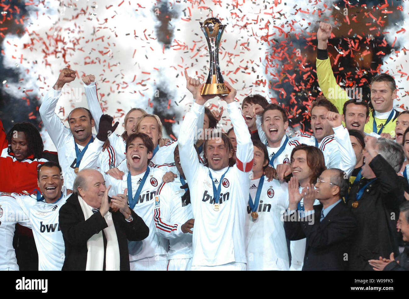 Paolo Maldini (C), of AC Milan, holds the champion trophy after winning the FIFA Club Worldcup 2007 at the Nissan Stadium in Yokohama, Japan, on December 16 2007. AC Milan defeated Boca Juniors 4-2. (UPI Photo/Keizo Mori) Stock Photo