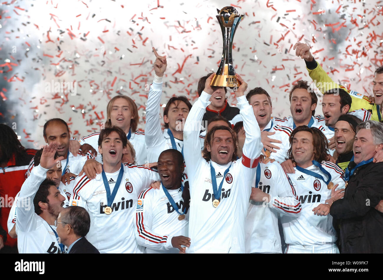 Paolo Maldini (C), of AC Milan, holds the champion trophy after winning the FIFA Club Worldcup 2007 at the Nissan Stadium in Yokohama, Japan, on December 16 2007. AC Milan defeated Boca Juniors 4-2. (UPI Photo/keizo Mori) Stock Photo