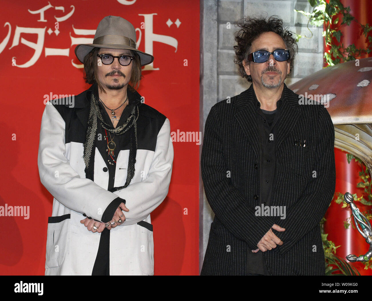 Actor Johnny Depp and film director Tim Burton attend a photo call event  for the premiere