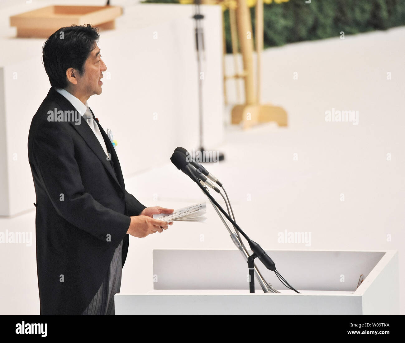 Japan's Prime Minister Shinzo Abe attends the memorial service for the war dead of World War II
