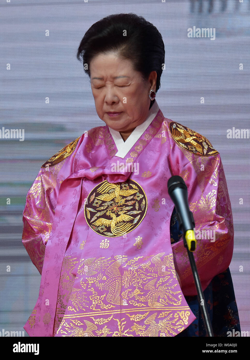 Hak-Ja Han, wife of late Unification Church founder Sun Myung Moon prays a Blessing Ceremony of the Family Federation for World Peace and Unification at the CheongShim Peace World Center in Gapyeong, South Korea, on February 20, 2016.     Photo by keizo Mori Stock Photo