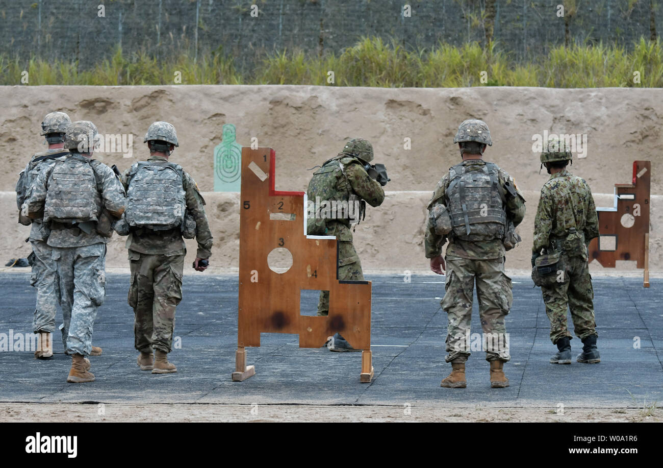 Member of U.S. Army 2nd Battalion, 27th Infantry Regiment, 3rd Brigade Combat Team, 25th Infantry Division takes part with JGSDF (Japan Ground Self-Defense Force) 3rd division infantry regiment in the shooting practice during the joint military exercise 'Orient seld 16' at the Aibano Training Area in Takashima, Shiga prefecture, Japan on September 14, 2016.     Photo by Keizo Mori/UPI Stock Photo