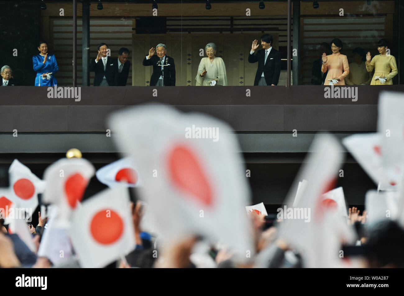 Japan's Emperor Akihito(L3) waves to well-wishers with Prince Hitachi(L), Empress Michiko(L5), Crown prince Naruhito(L3), Crown princess Masako(L2), Prince Akishino (R3), his wife Princess Kiko(R2) and Princess  Mako(R) during a new year greeting at the East Plaza, Imperial Palace in Tokyo, Japan, on January 2, 2017.     Photo by Keizo Mori/UPI Stock Photo